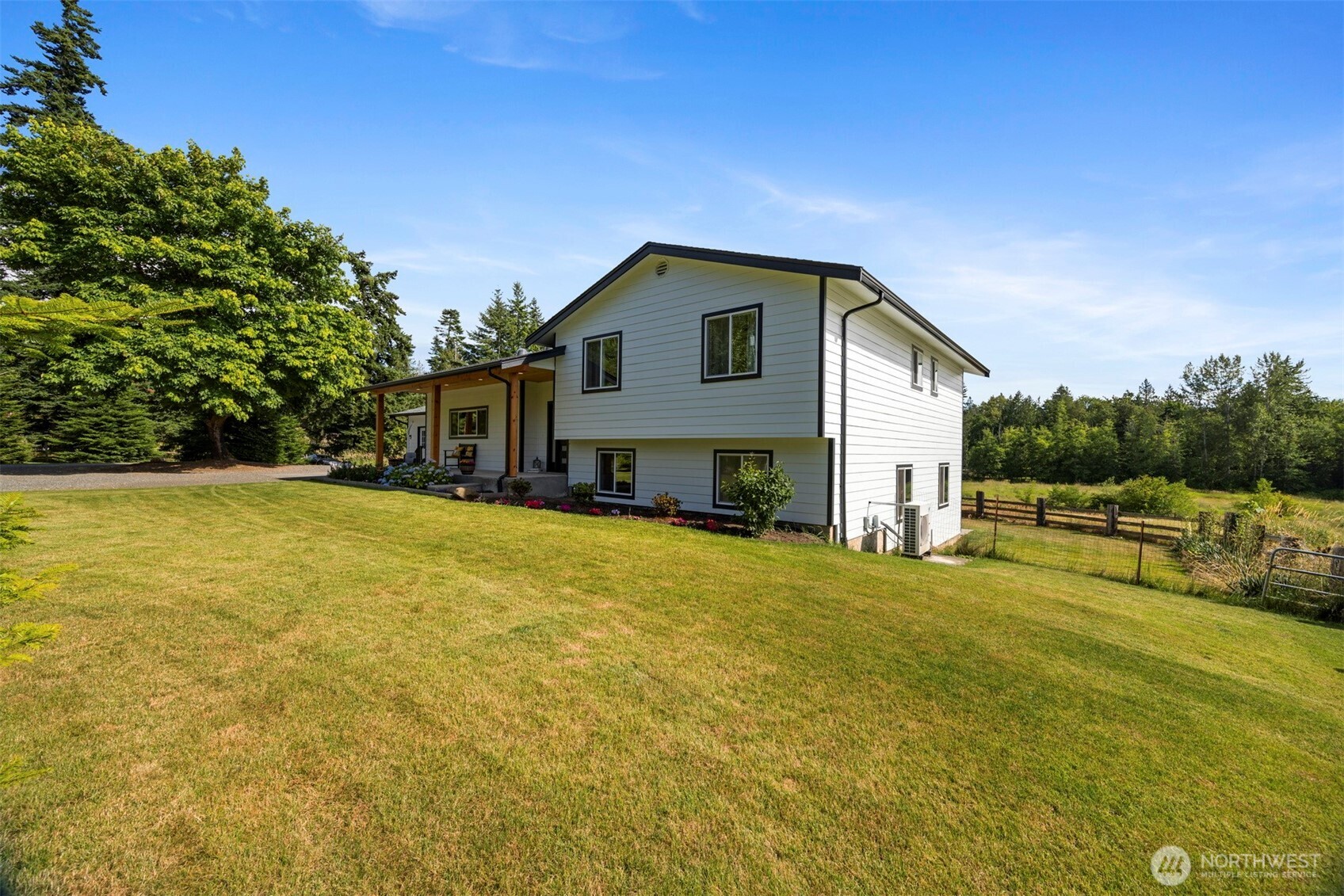 2403 East Hemmi Road Bellingham, WA 98226 - Photo 31 of 40 a house view with swimming pool in front of it