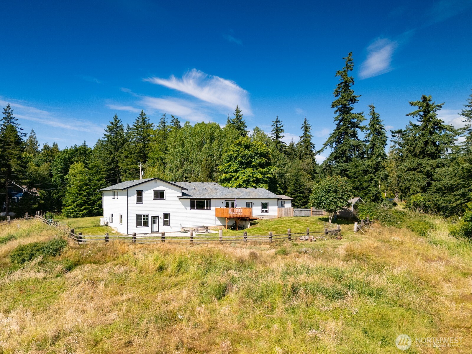 2403 East Hemmi Road Bellingham, WA 98226 - Photo 32 of 40 a house view with a swimming pool