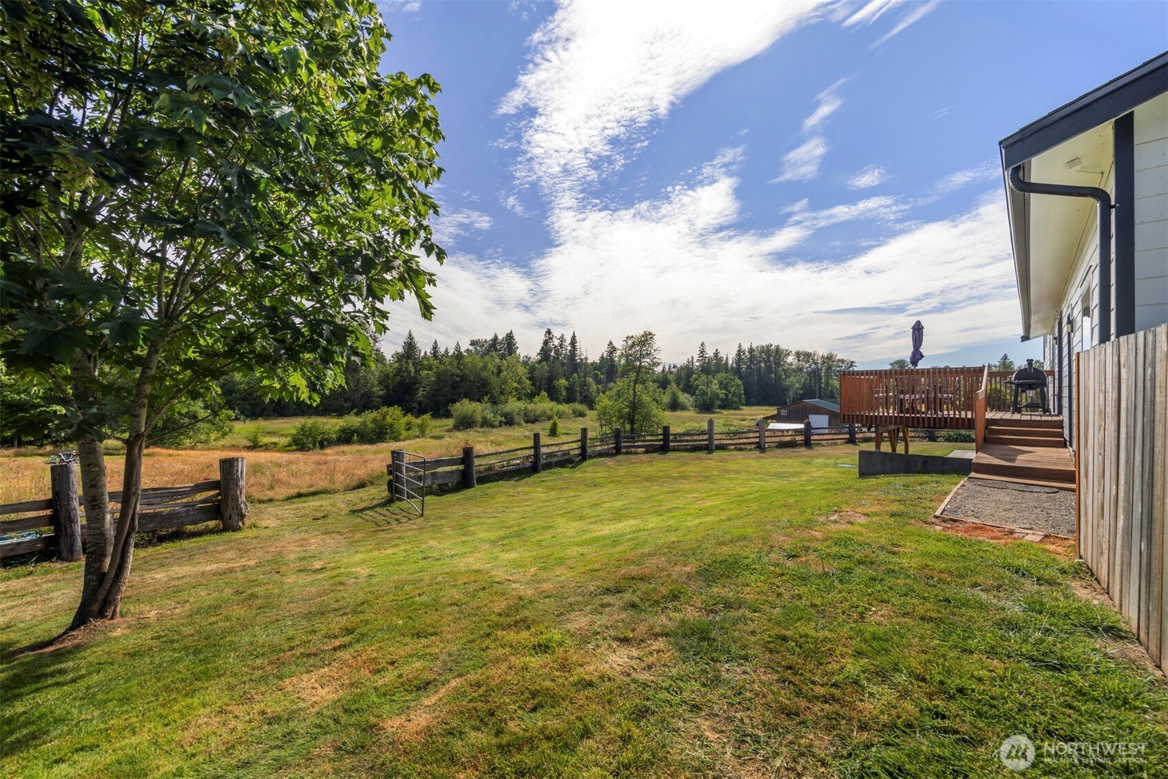 2403 East Hemmi Road Bellingham, WA 98226 - Photo 35 of 40 a view of a lake with a yard