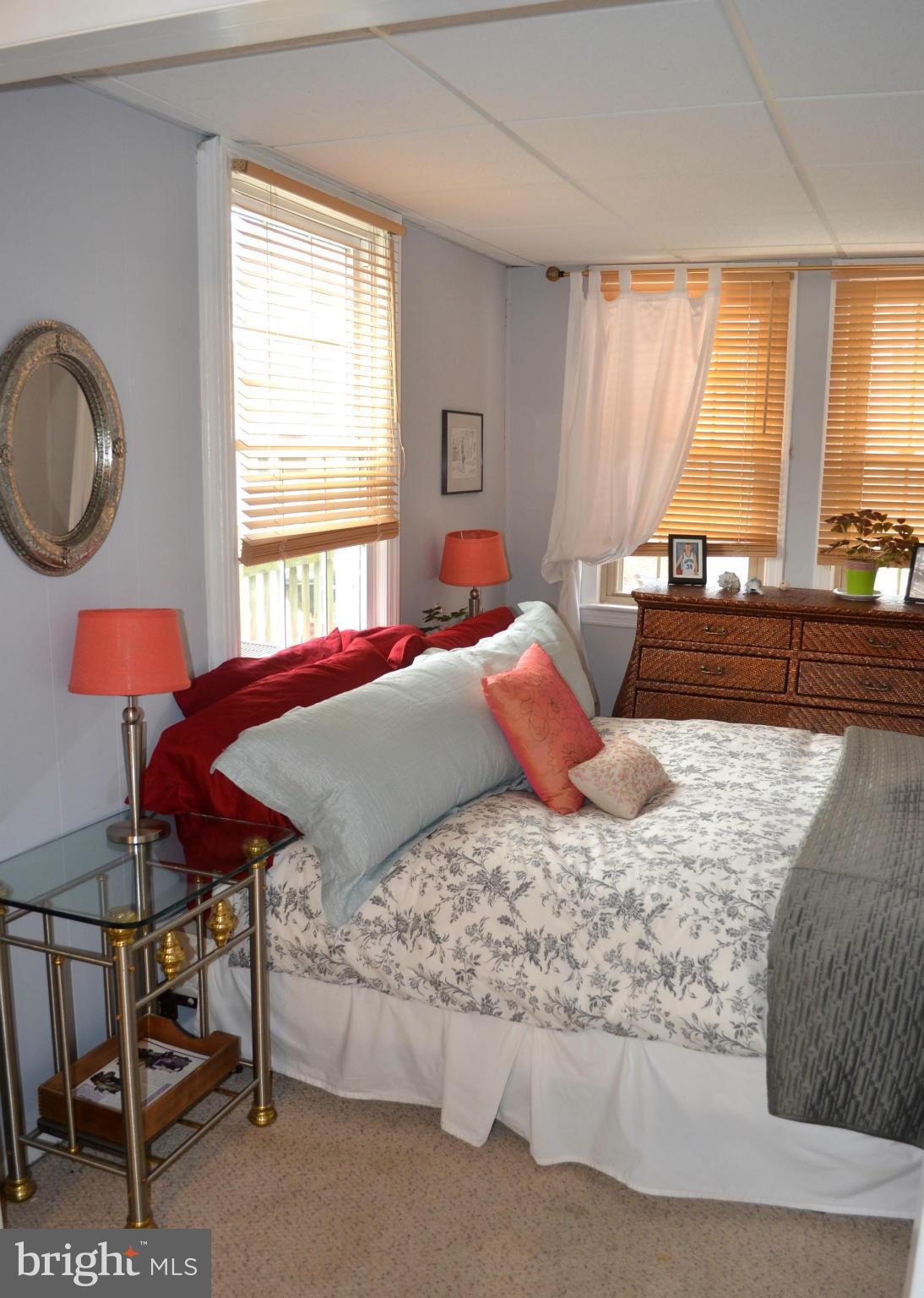 106 Indian Spring Drive Silver Spring, MD 20901 - Photo 14 of 30 a bedroom with a bed and a window