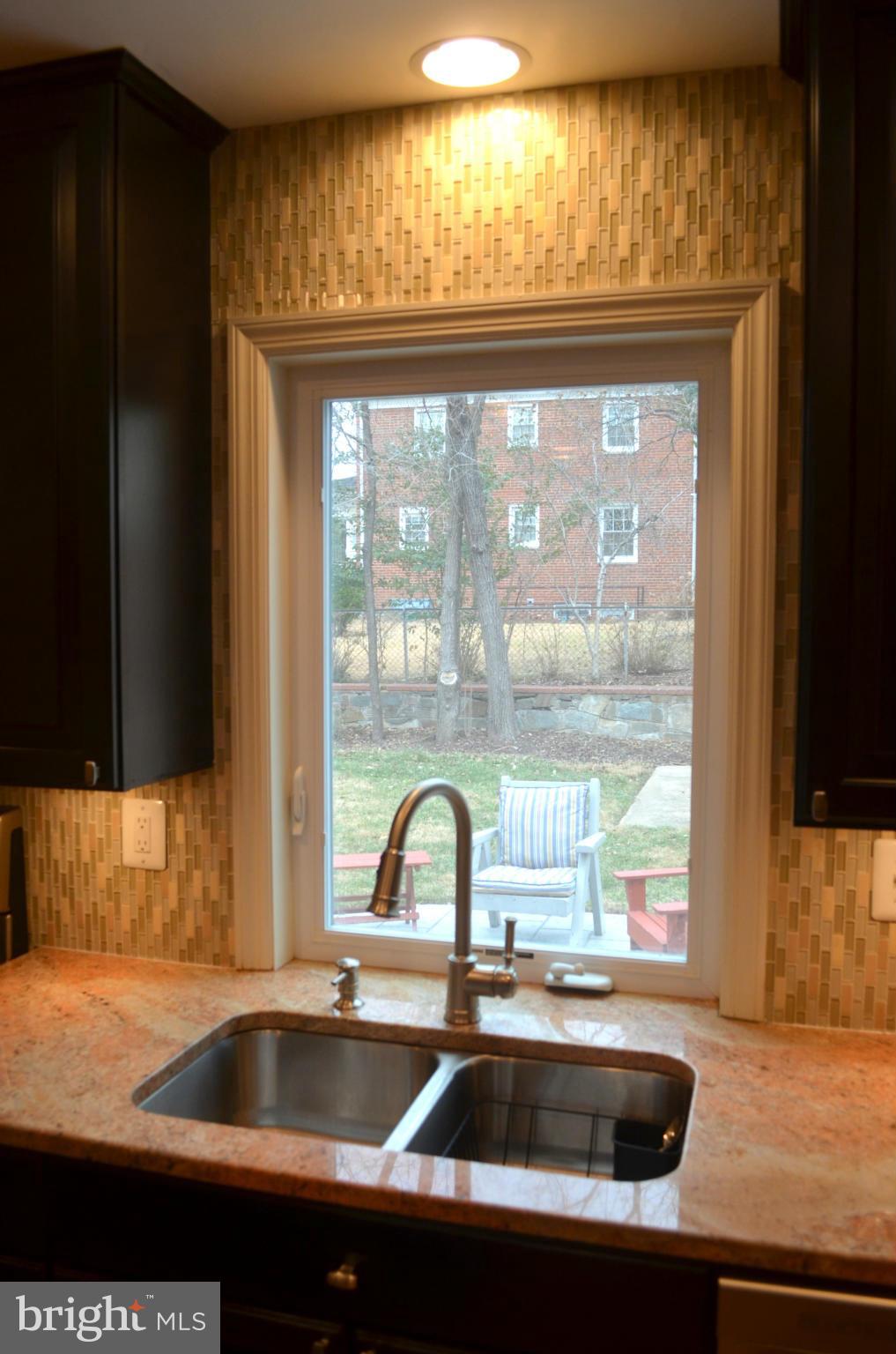 106 Indian Spring Drive Silver Spring, MD 20901 - Photo 19 of 30 a kitchen with a sink and large window
