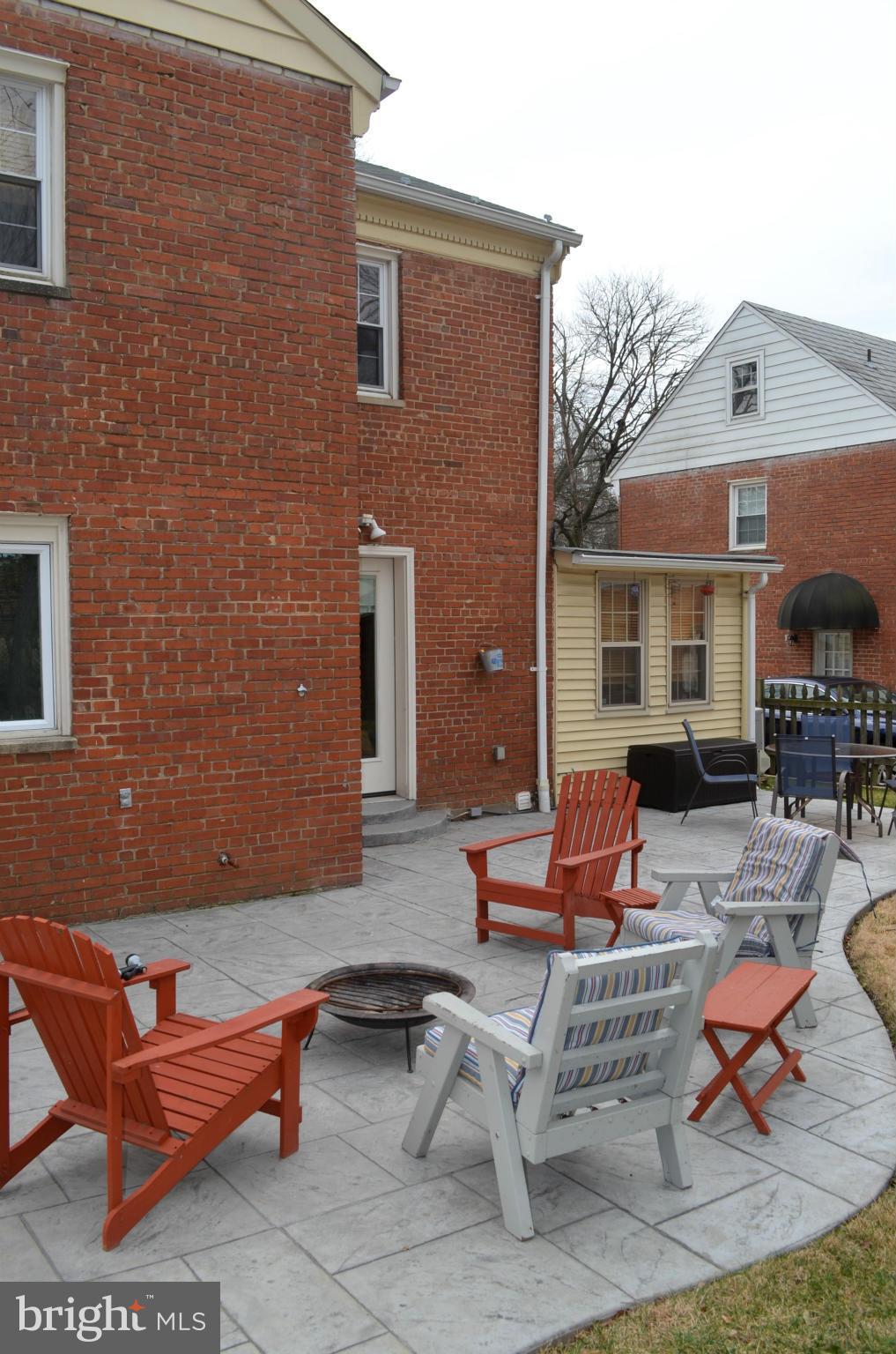 106 Indian Spring Drive Silver Spring, MD 20901 - Photo 7 of 30 a backyard of a house with seating space