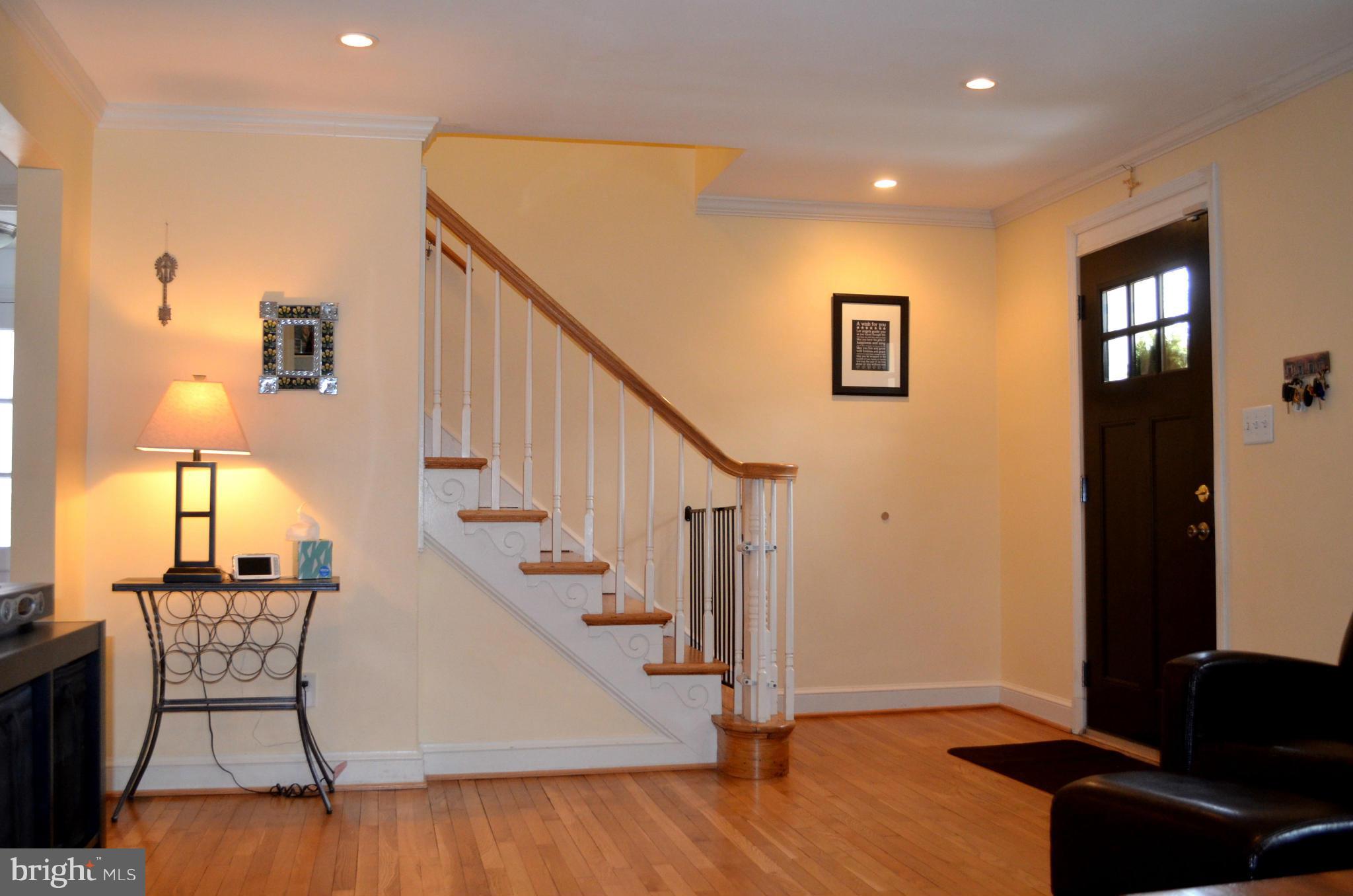 106 Indian Spring Drive Silver Spring, MD 20901 - Photo 8 of 30 a view of entryway and hall with wooden floor
