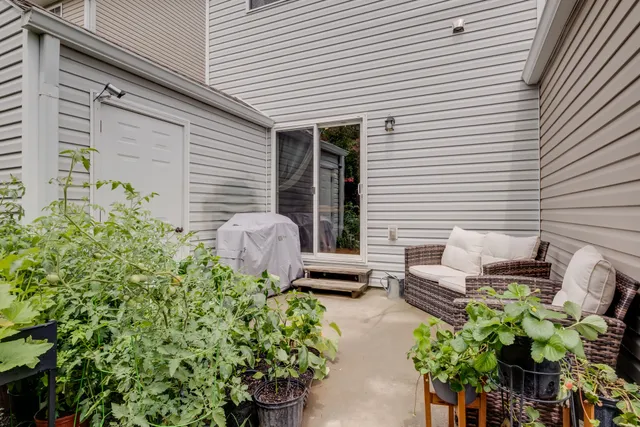 a front view of a house with patio