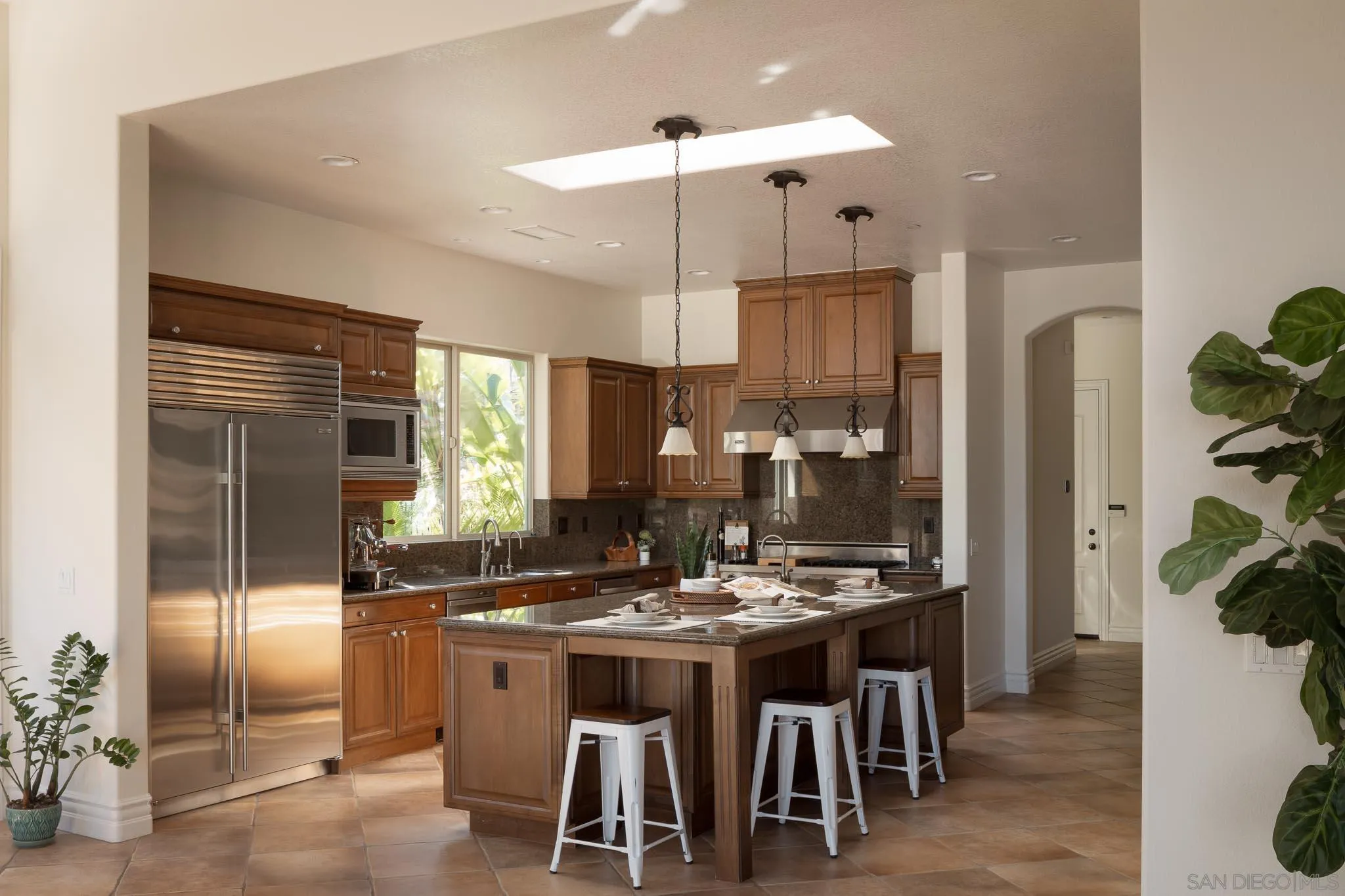14014 Lake Poway Road Poway, CA 92064 - Photo 11 of 55 a kitchen with a refrigerator and countertop