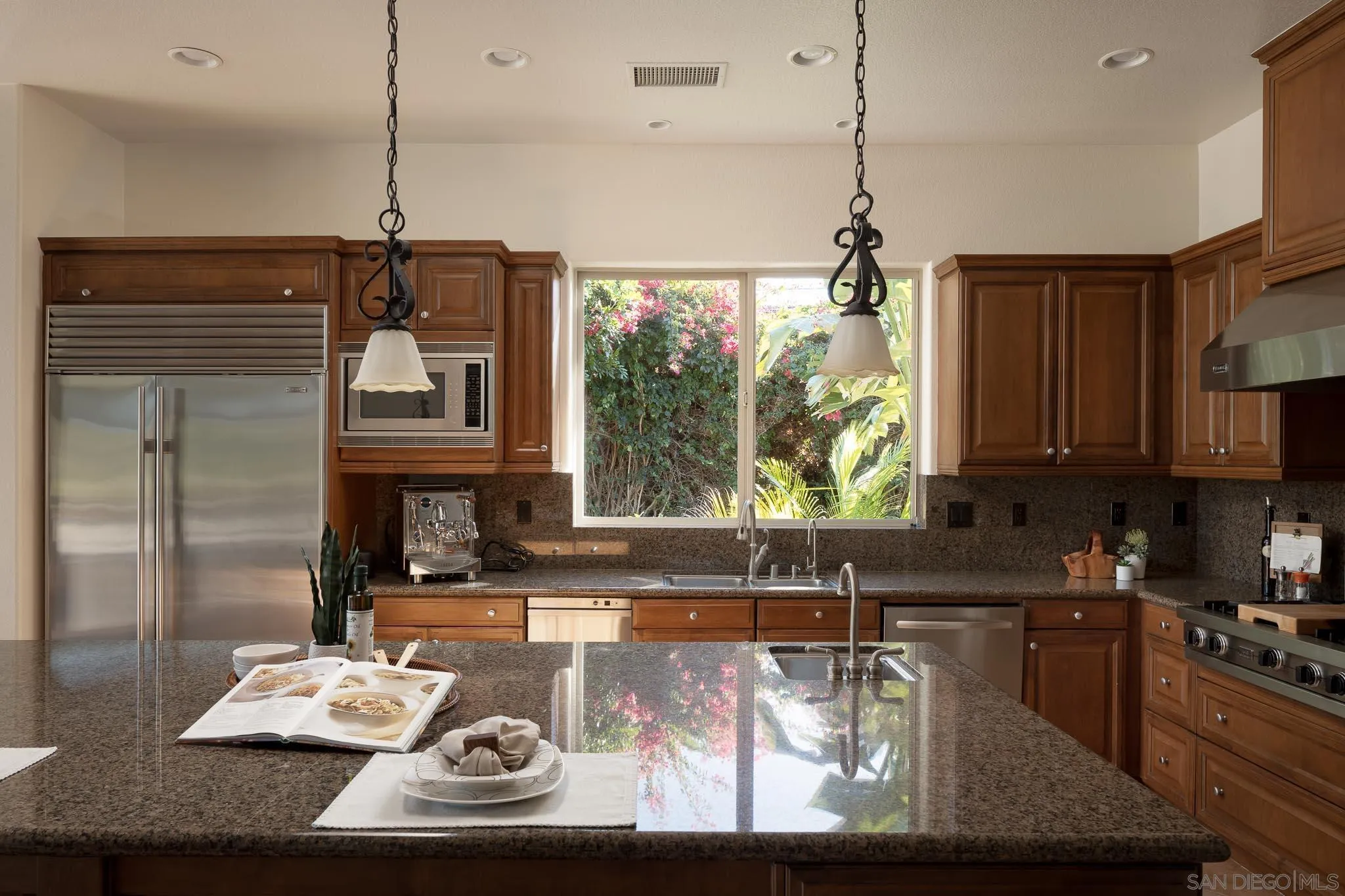 14014 Lake Poway Road Poway, CA 92064 - Photo 12 of 55 a kitchen with sink refrigerator and microwave