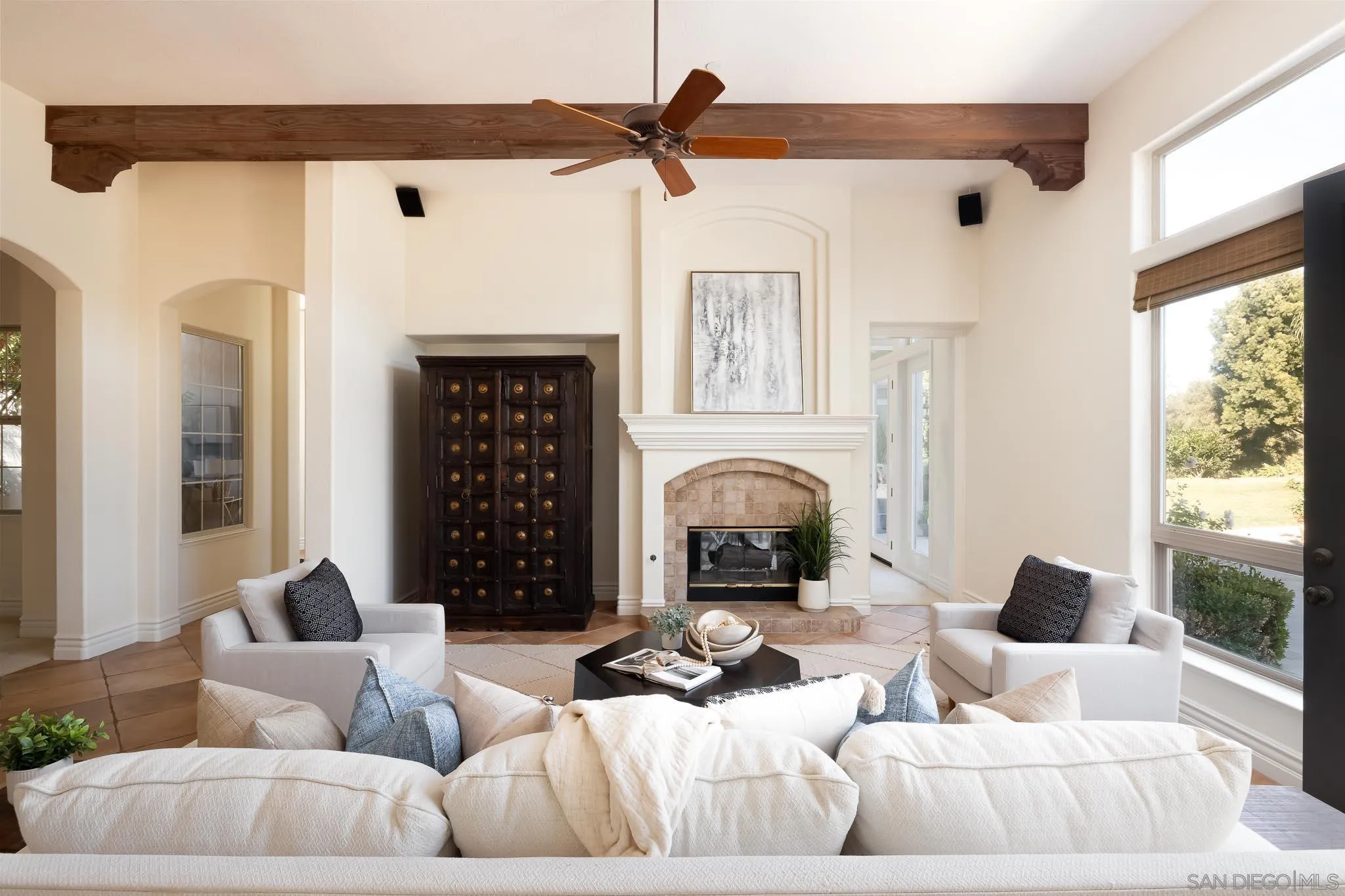 14014 Lake Poway Road Poway, CA 92064 - Photo 16 of 55 a living room with furniture fireplace and a large window