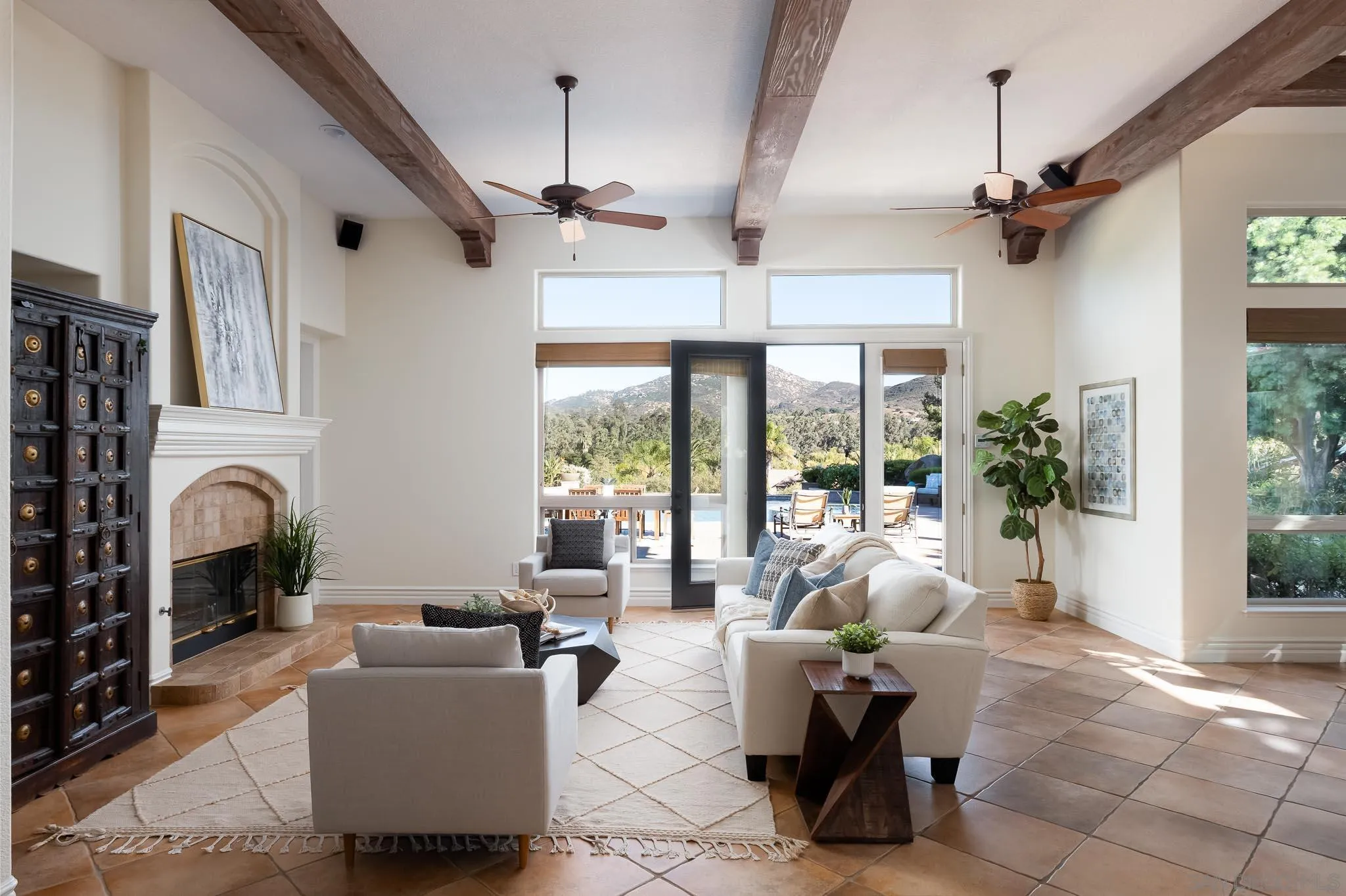 14014 Lake Poway Road Poway, CA 92064 - Photo 17 of 55 a living room with furniture a fireplace and large windows