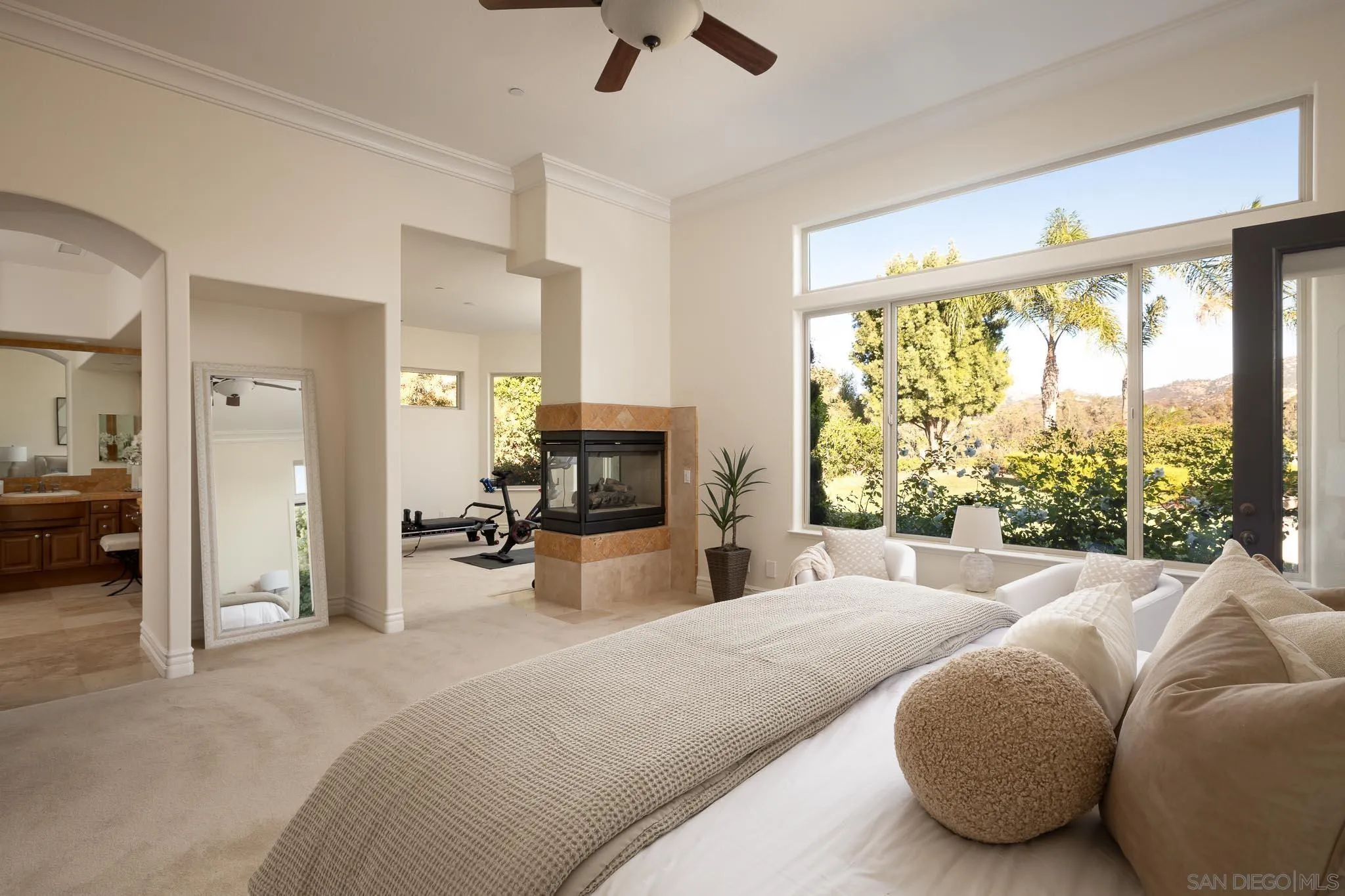 14014 Lake Poway Road Poway, CA 92064 - Photo 22 of 55 a large bedroom with a large bed and a large window