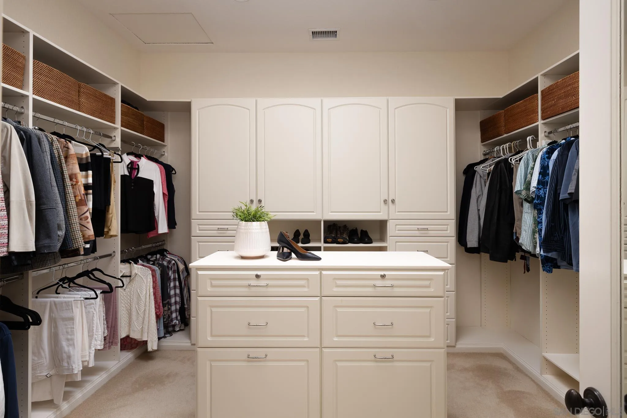 14014 Lake Poway Road Poway, CA 92064 - Photo 26 of 55 a view of walk in closet with clothes and shoes