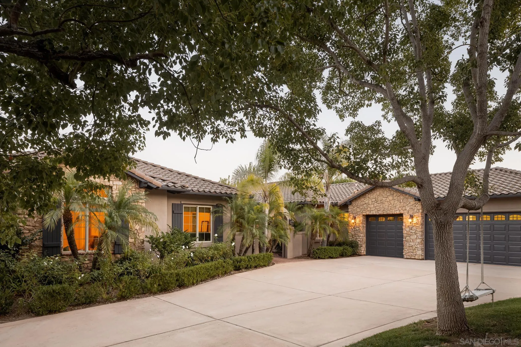 14014 Lake Poway Road Poway, CA 92064 - Photo 3 of 55 a front view of a house with a yard and tree