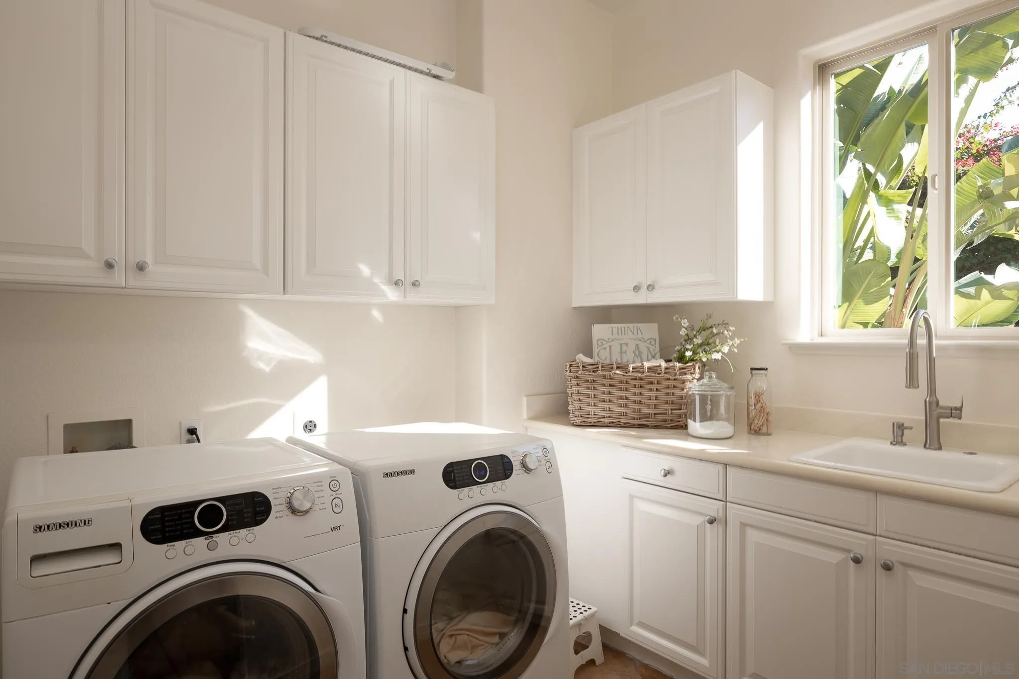 14014 Lake Poway Road Poway, CA 92064 - Photo 33 of 55 a view of a kitchen with sink washer and dryer