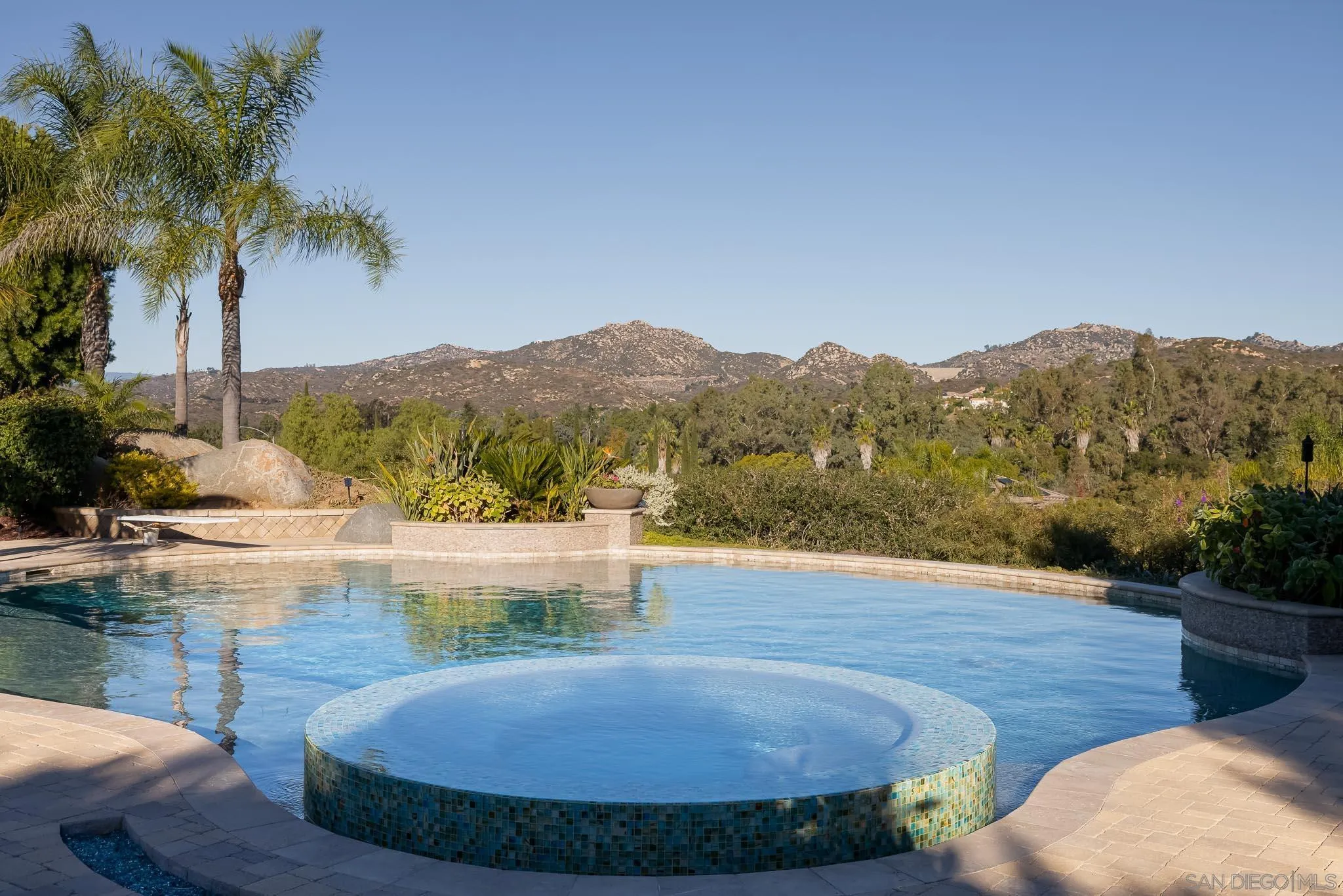 14014 Lake Poway Road Poway, CA 92064 - Photo 40 of 55 a view of a swimming pool with a yard