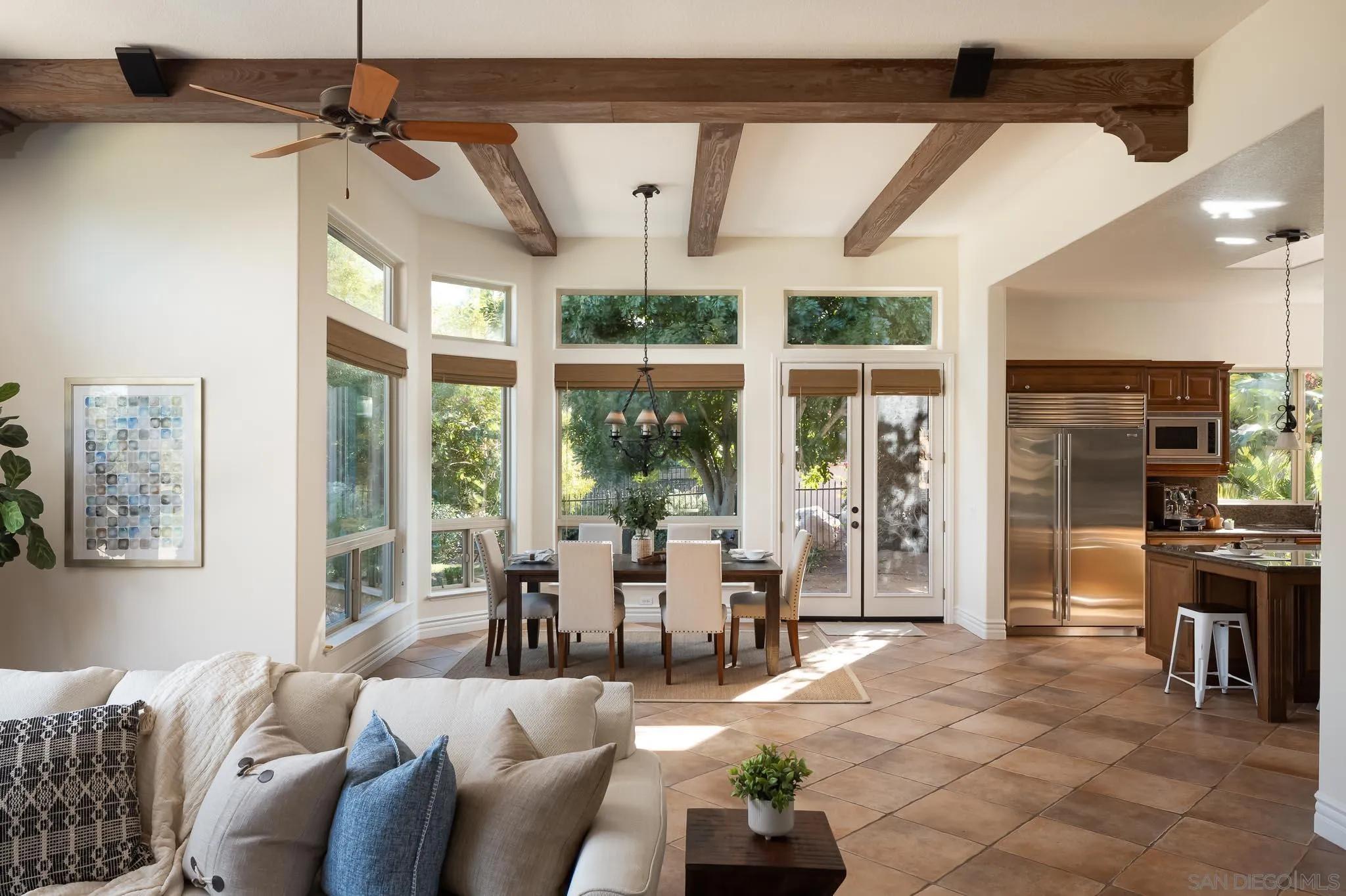 14014 Lake Poway Road Poway, CA 92064 - Photo 8 of 55 a living room with furniture a flat screen tv and a floor to ceiling window