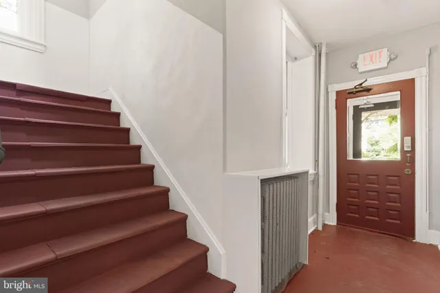 a view of entryway with wooden floor