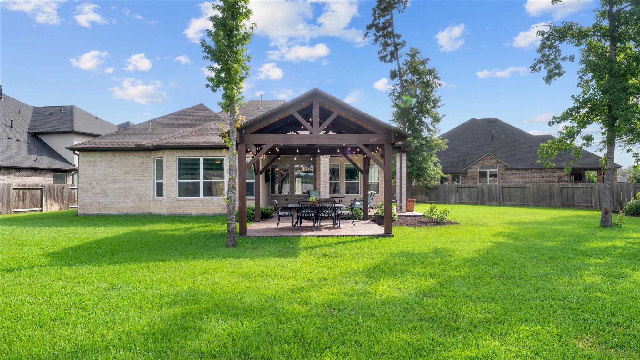 32001 Birch Briar Court Spring, TX 77386 - Photo 41 of 48 Expansive, fully fenced backyard with lush green space and endless possibilities for a pool, play area, or outdoor entertaining.