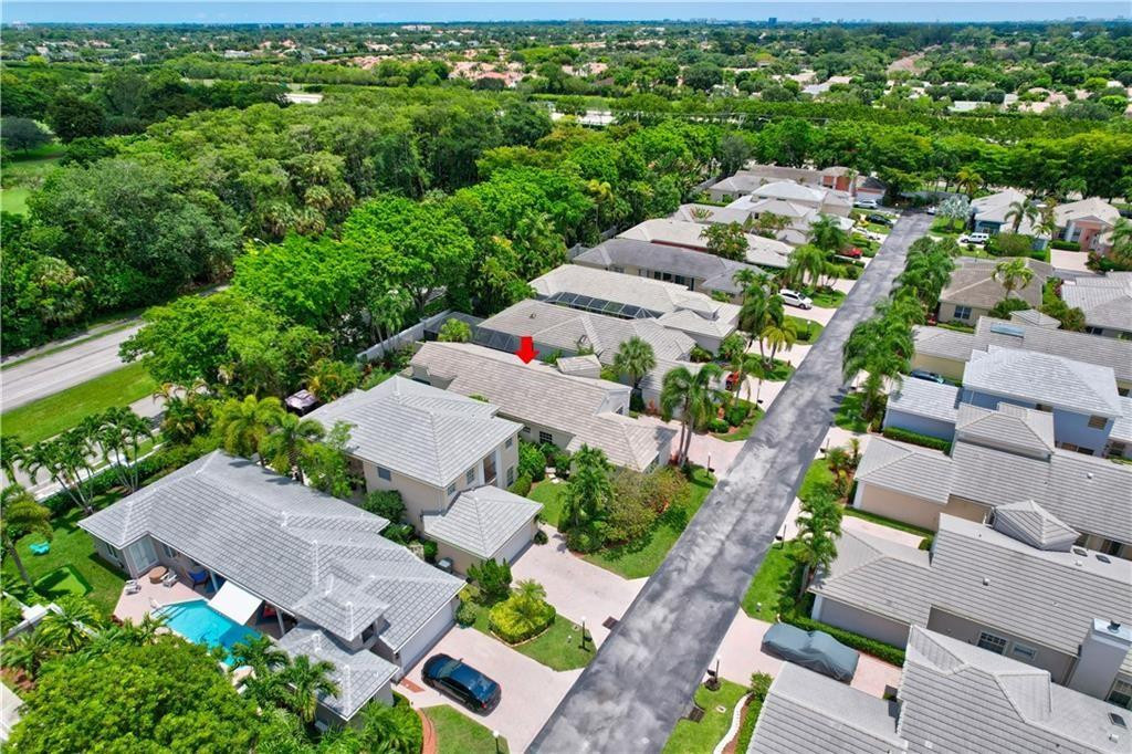 8171 Hampton Wood Drive Boca Raton, FL 33433 - Photo 39 of 56 an aerial view of multiple houses with yard