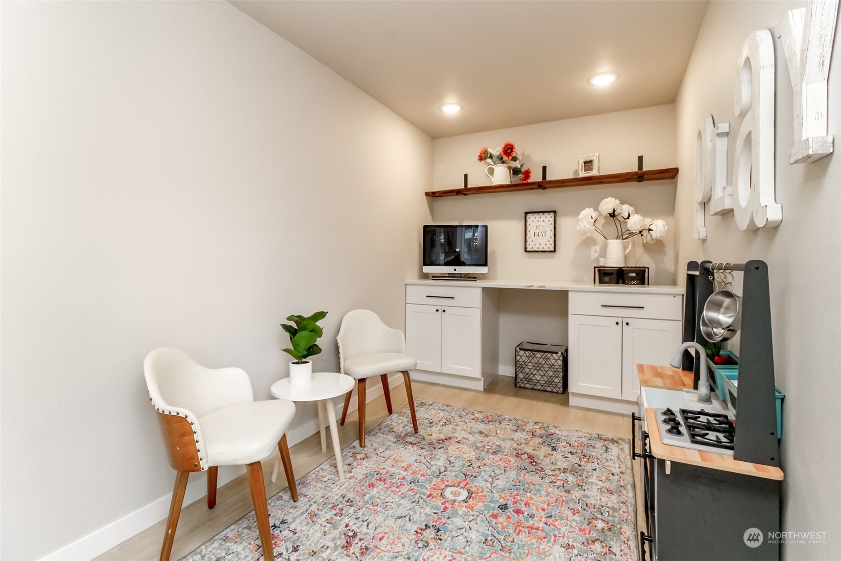 3017 Forest Rim Court South Puyallup, WA 98374 - Photo 11 of 40 a living room with furniture and a fireplace