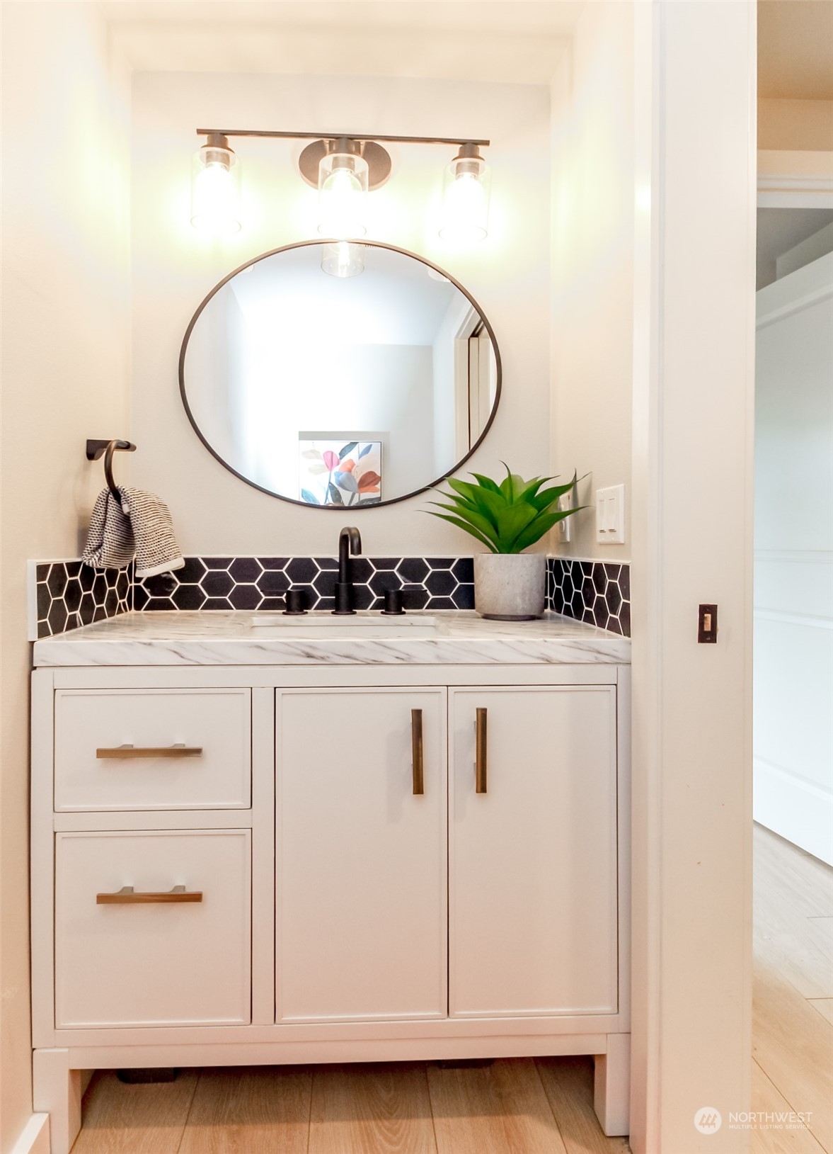 3017 Forest Rim Court South Puyallup, WA 98374 - Photo 12 of 40 a bathroom with a sink and a mirror