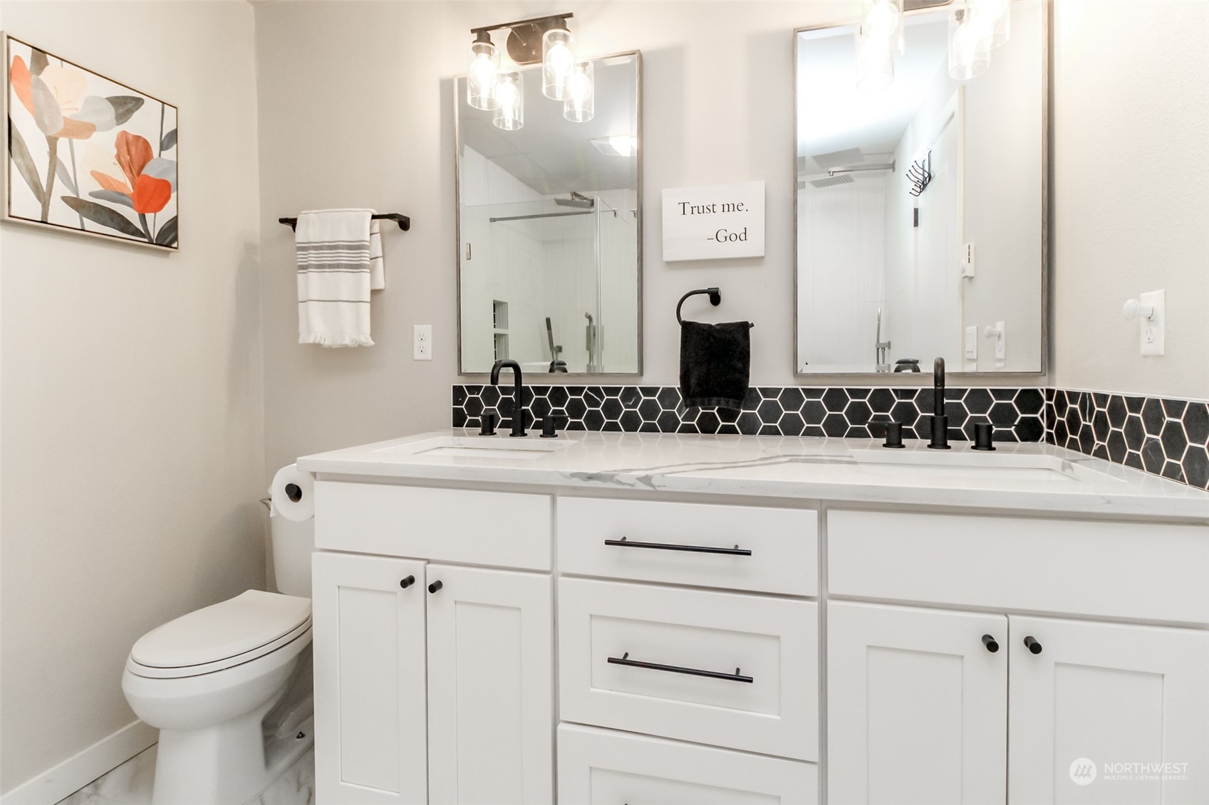 3017 Forest Rim Court South Puyallup, WA 98374 - Photo 15 of 40 a bathroom with a sink and a toilet