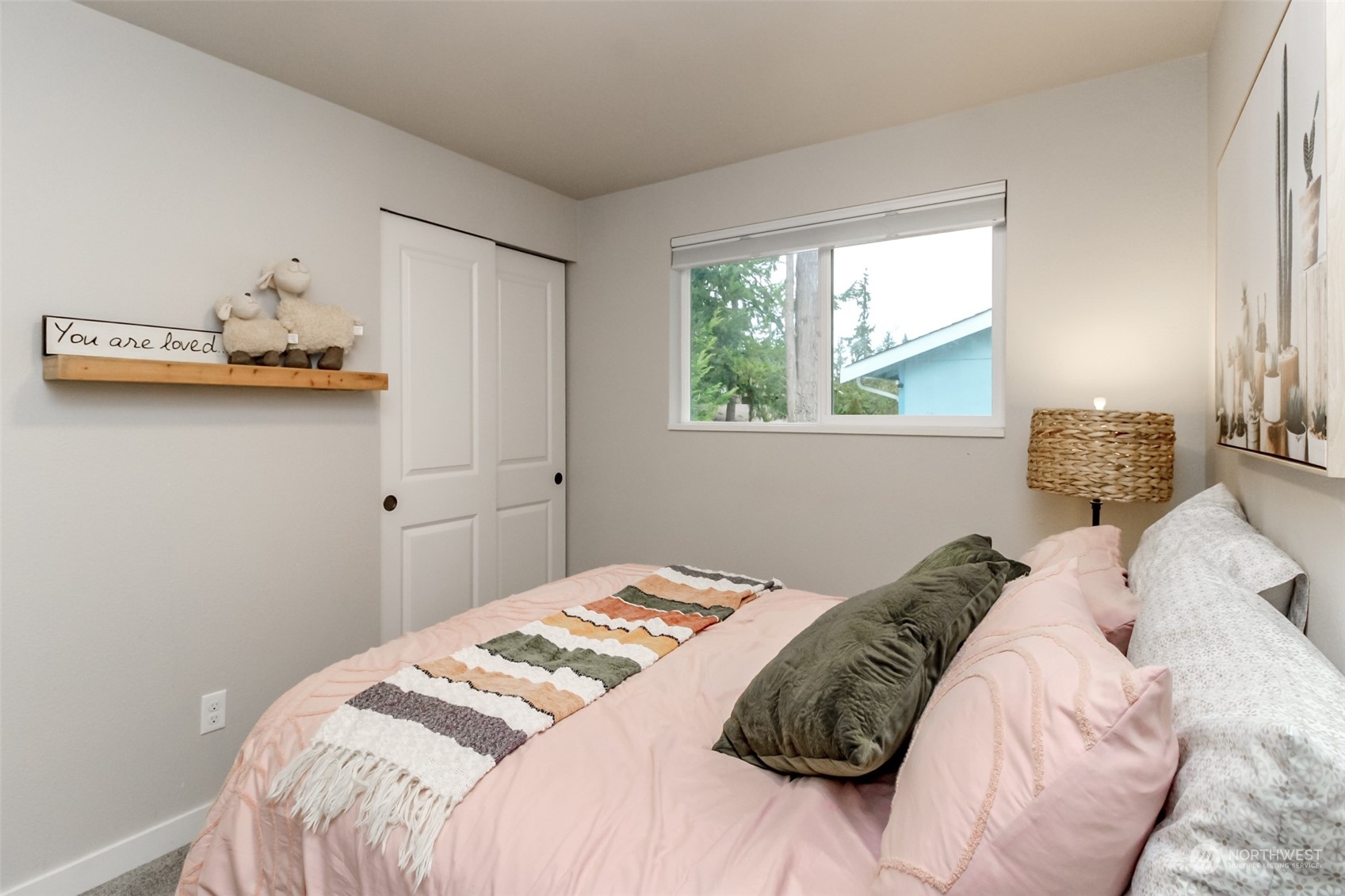 3017 Forest Rim Court South Puyallup, WA 98374 - Photo 18 of 40 a bedroom with a bed and a window