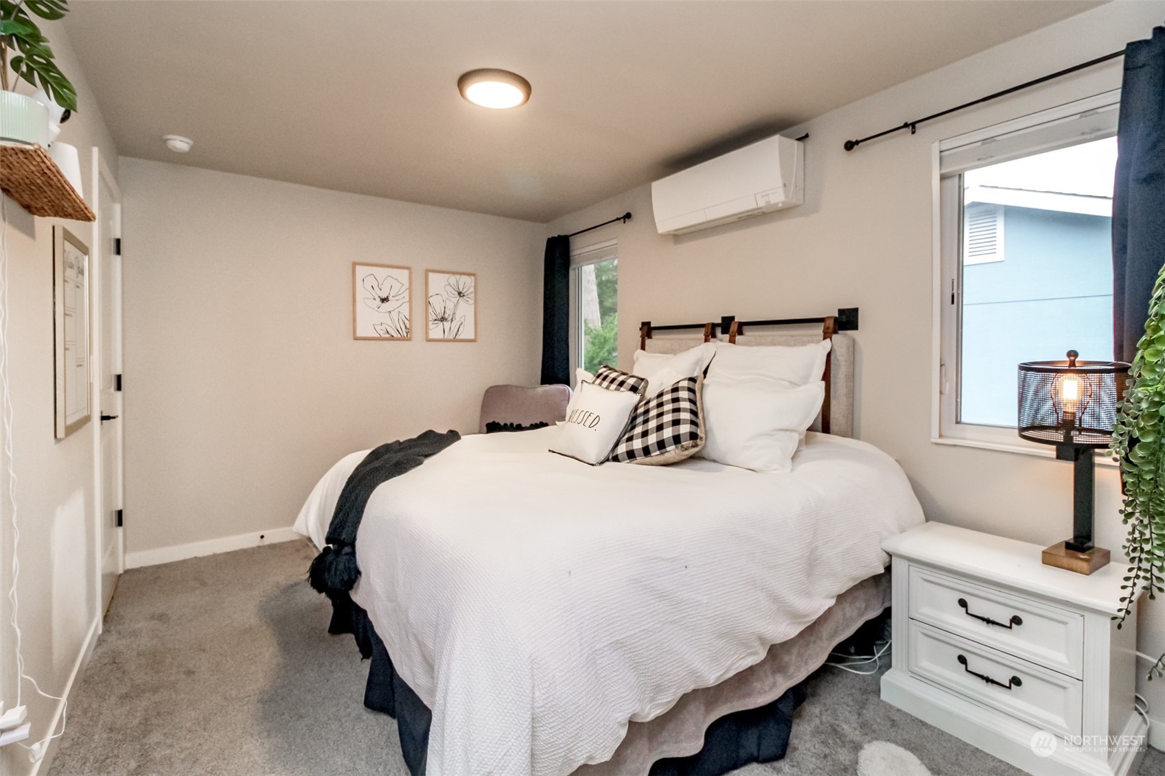 3017 Forest Rim Court South Puyallup, WA 98374 - Photo 20 of 40 a bedroom with a bed and with furniture