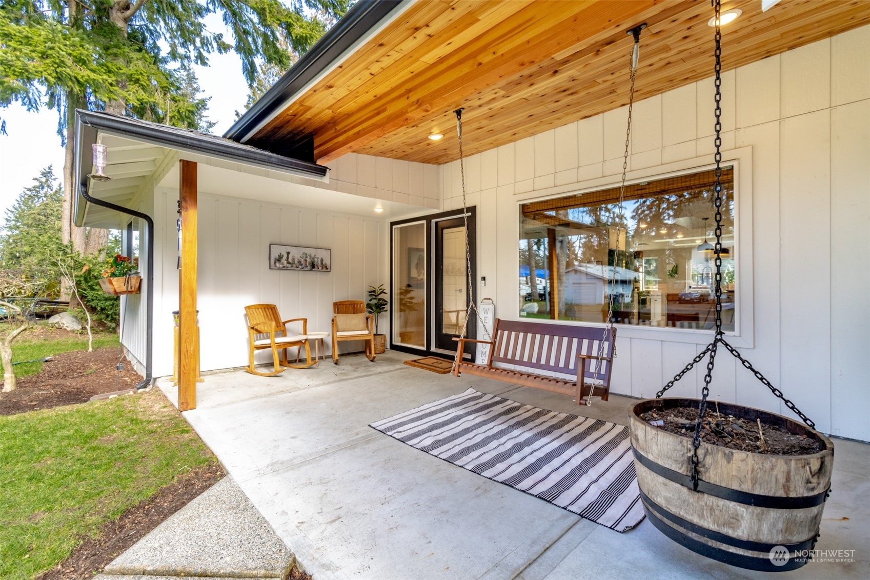 3017 Forest Rim Court South Puyallup, WA 98374 - Photo 28 of 40 a front view of a house with outdoor seating