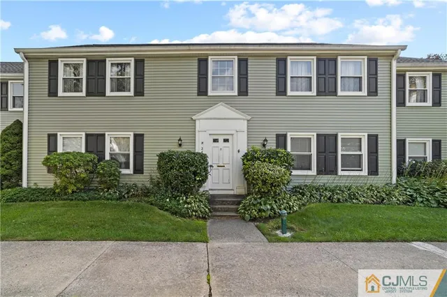 front view of house with a yard