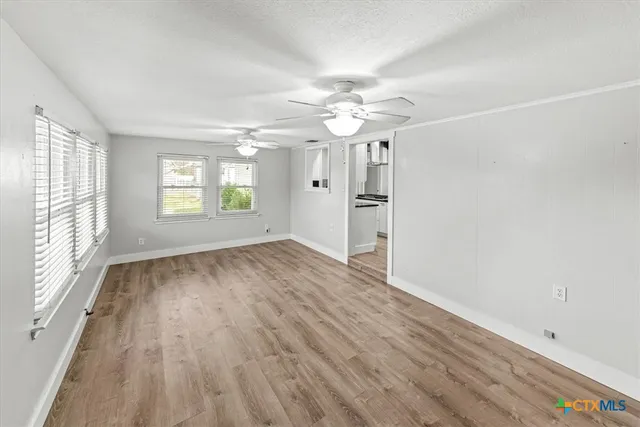 a bathroom with a sink a vanity and a toilet
