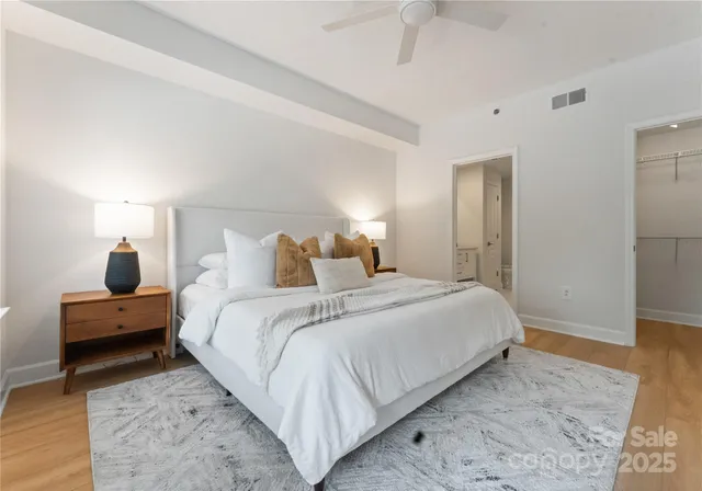 a bed room with a bed and a couch