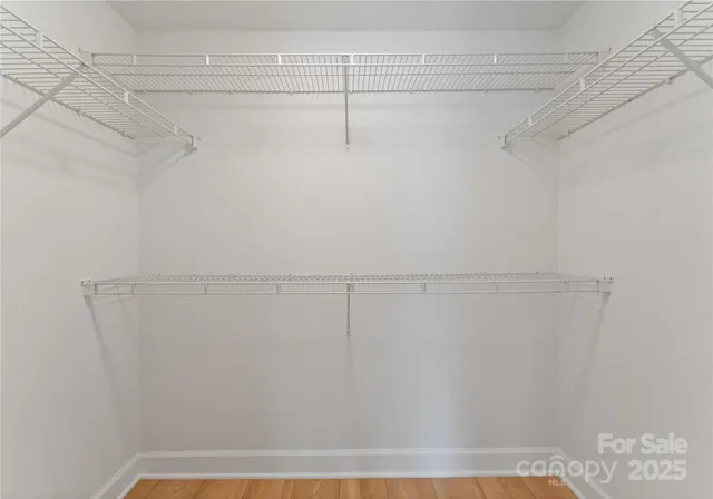 a view of a room with racks on the wall