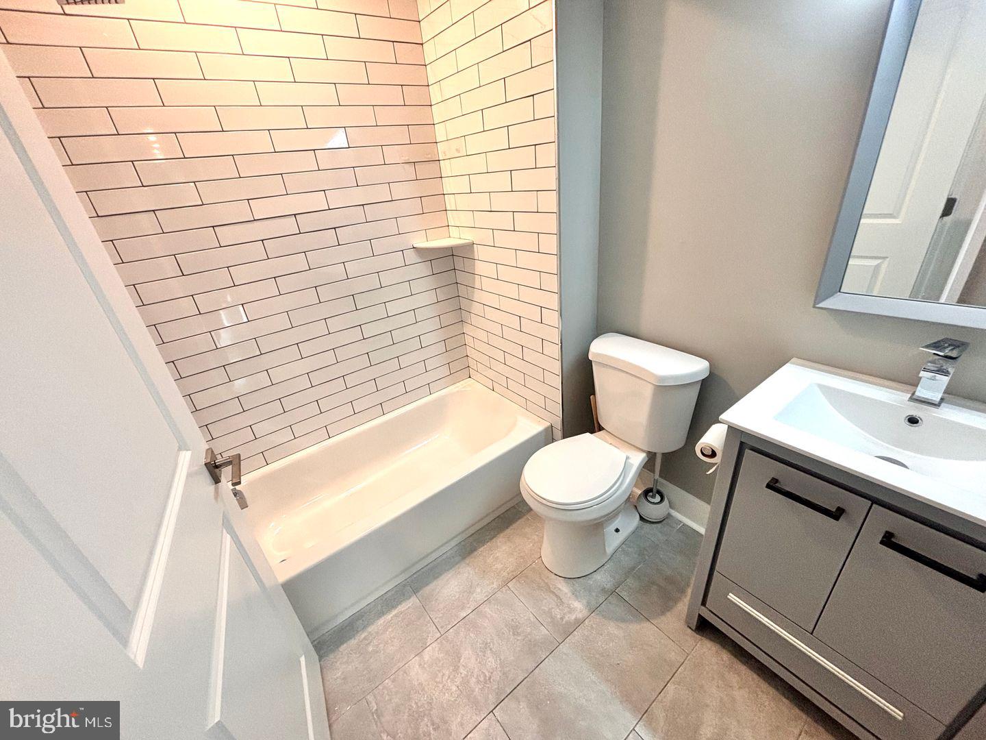 3255 Ridge Avenue Philadelphia, PA 19132 - Photo 13 of 28 a bathroom with a toilet sink and shower