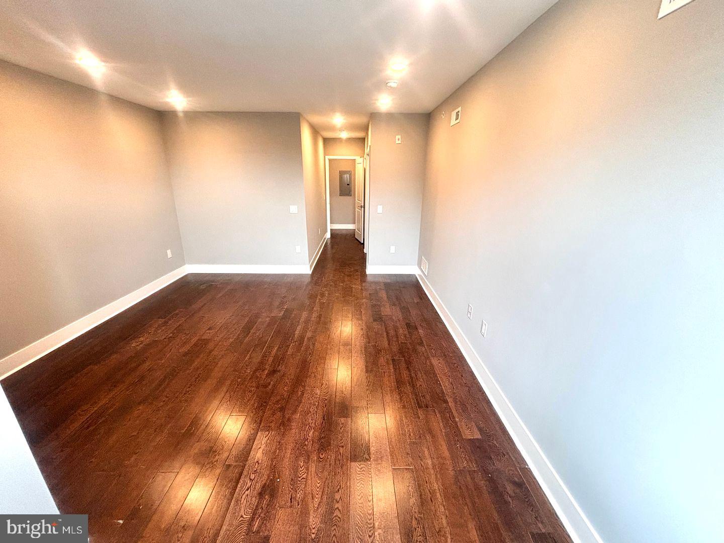 3255 Ridge Avenue Philadelphia, PA 19132 - Photo 15 of 28 a view of hallway with wooden floor