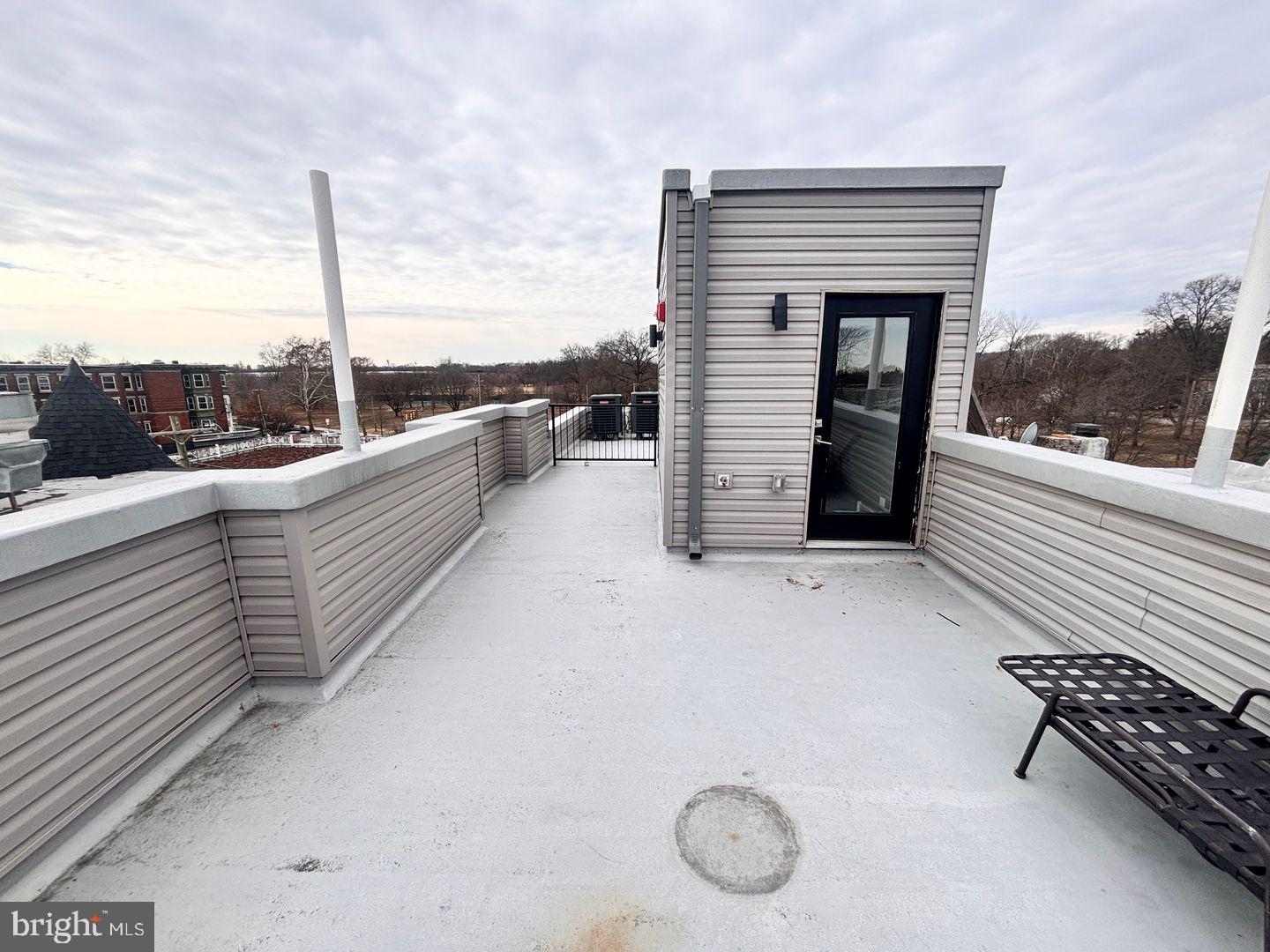 3255 Ridge Avenue Philadelphia, PA 19132 - Photo 28 of 28 a terrace with a table and chairs