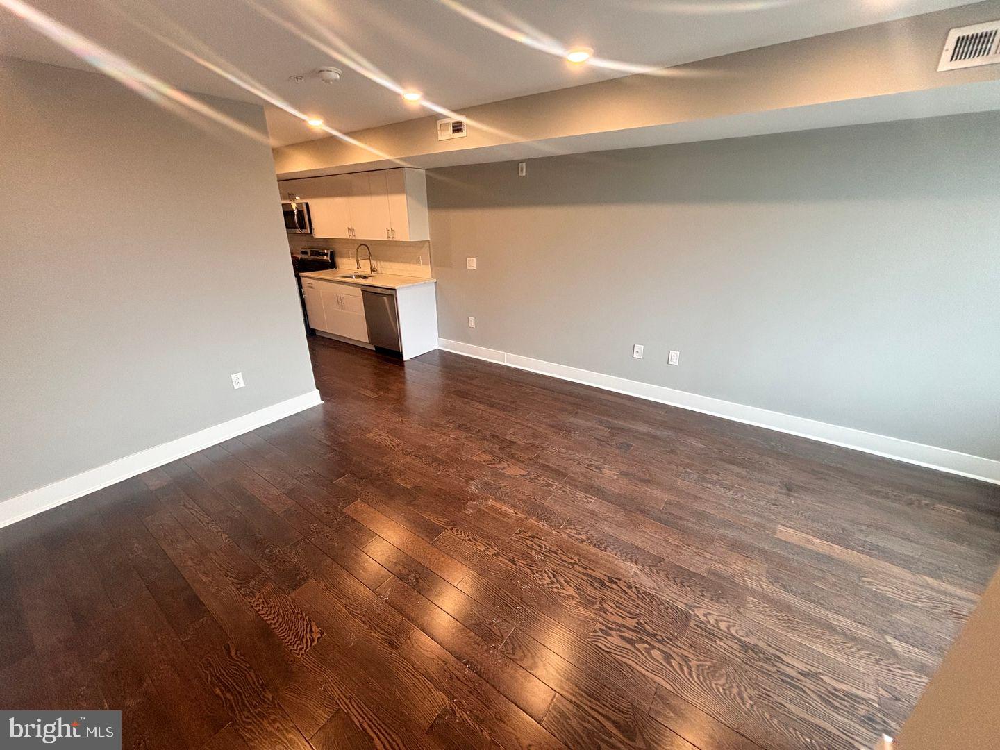3255 Ridge Avenue Philadelphia, PA 19132 - Photo 5 of 28 a view of empty room with wooden floor