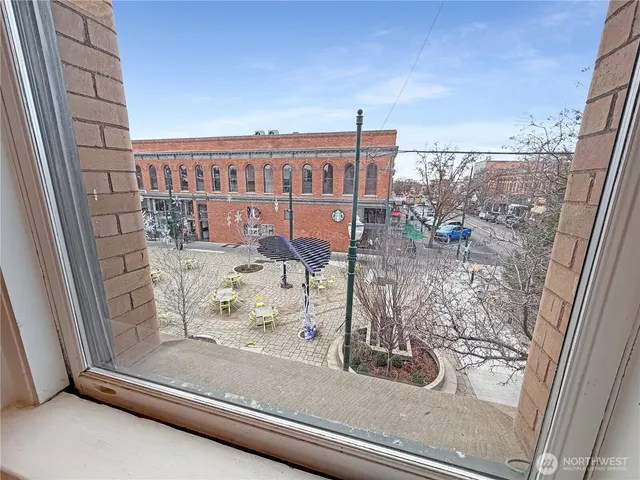 a view of a swimming pool with a lounge chairs