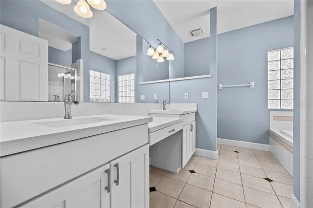 a living room with furniture fireplace and a flat screen tv