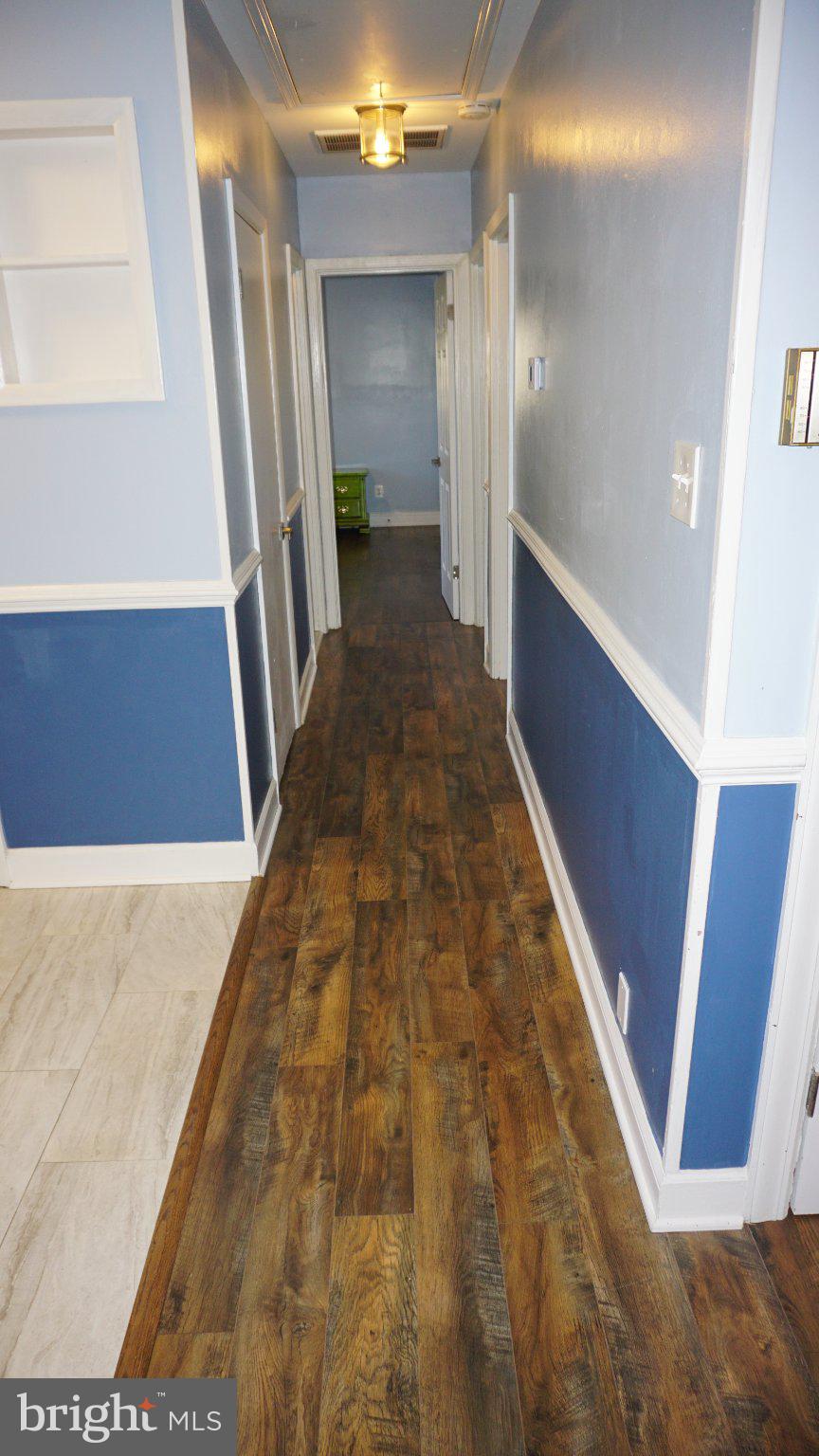 5854 Deale Churchton Road Deale, MD 20751 - Photo 31 of 57 Inviting hallway with modern charm.