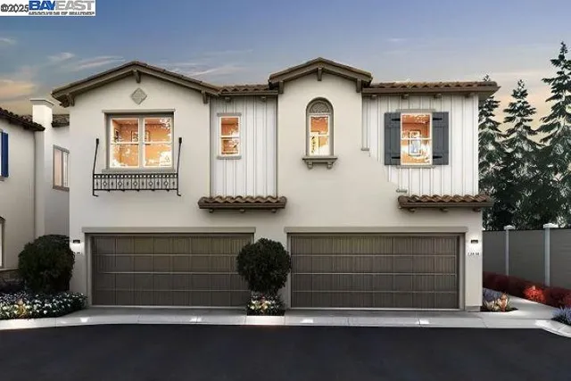 a front view of a house with a garage