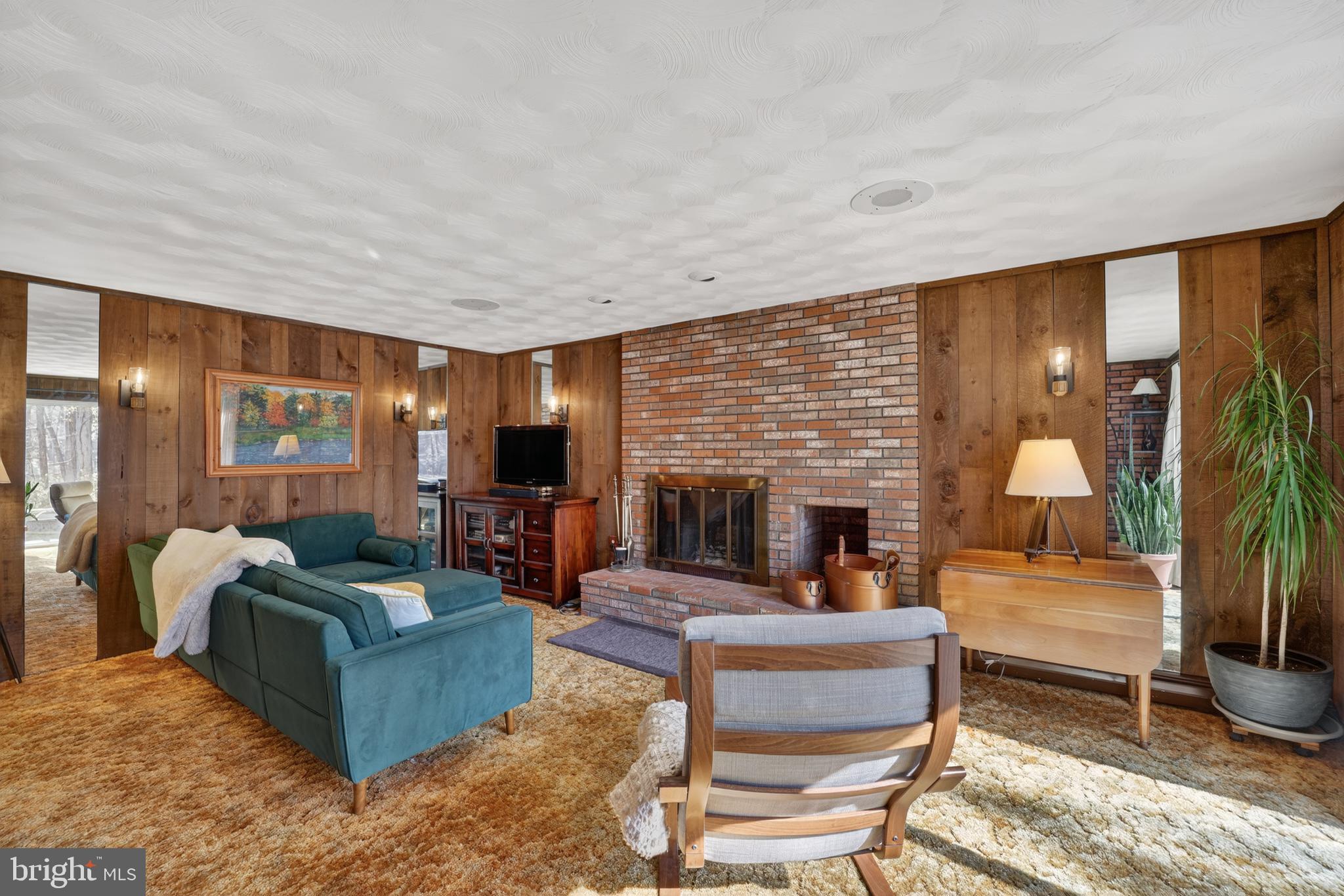 655 Santa Maria Lane Davidsonville, MD 21035 - Photo 25 of 54 a living room with fireplace furniture and a large window