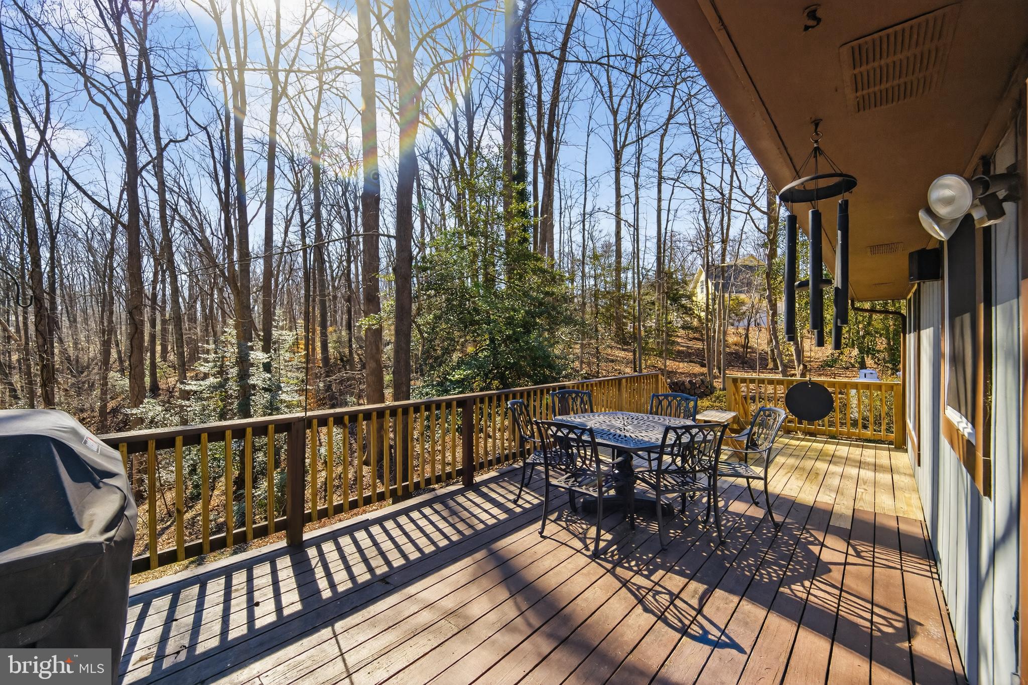 655 Santa Maria Lane Davidsonville, MD 21035 - Photo 31 of 54 a view of balcony with chairs and wooden fence