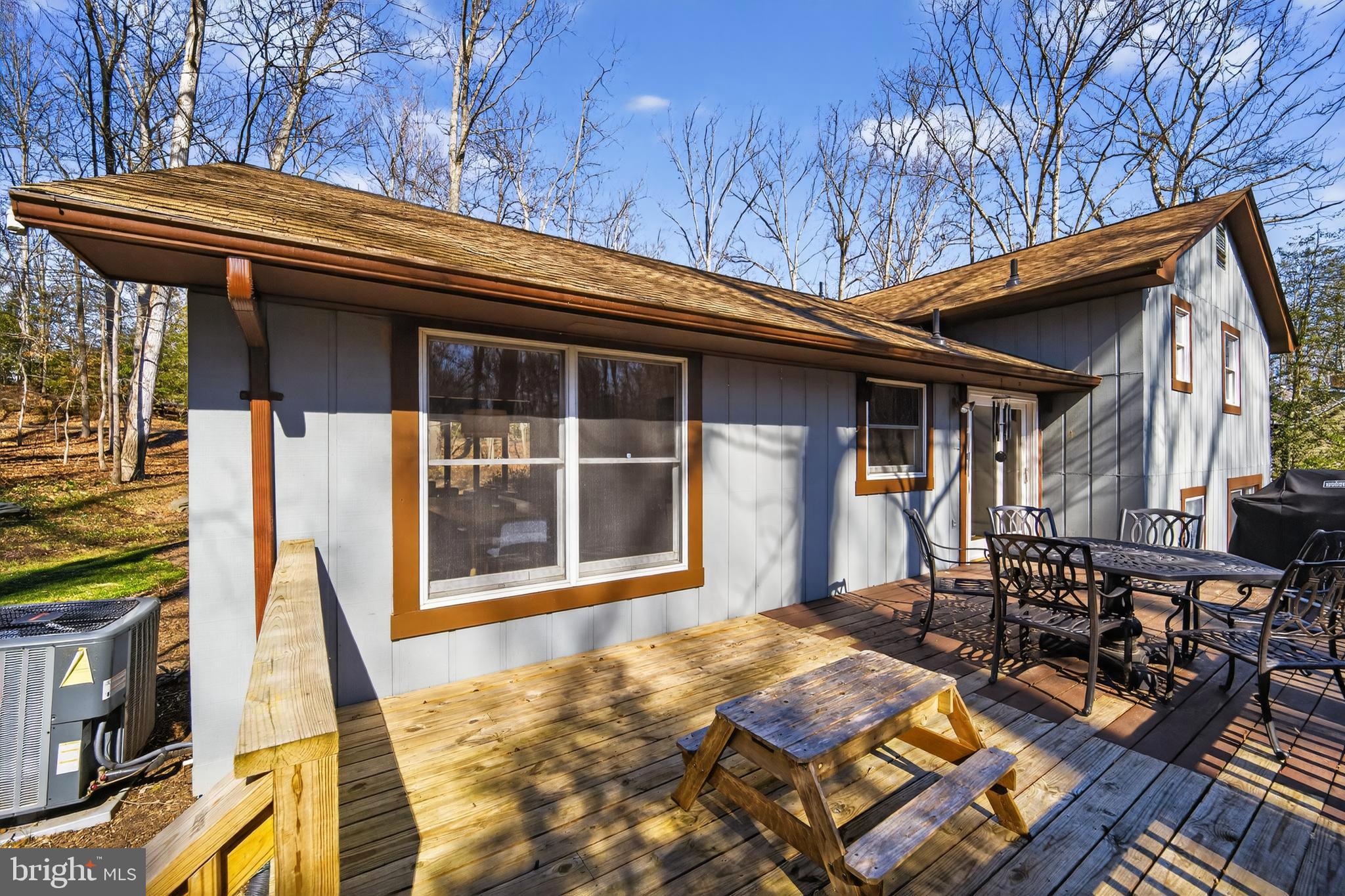 655 Santa Maria Lane Davidsonville, MD 21035 - Photo 32 of 54 a front view of house with deck and seating space