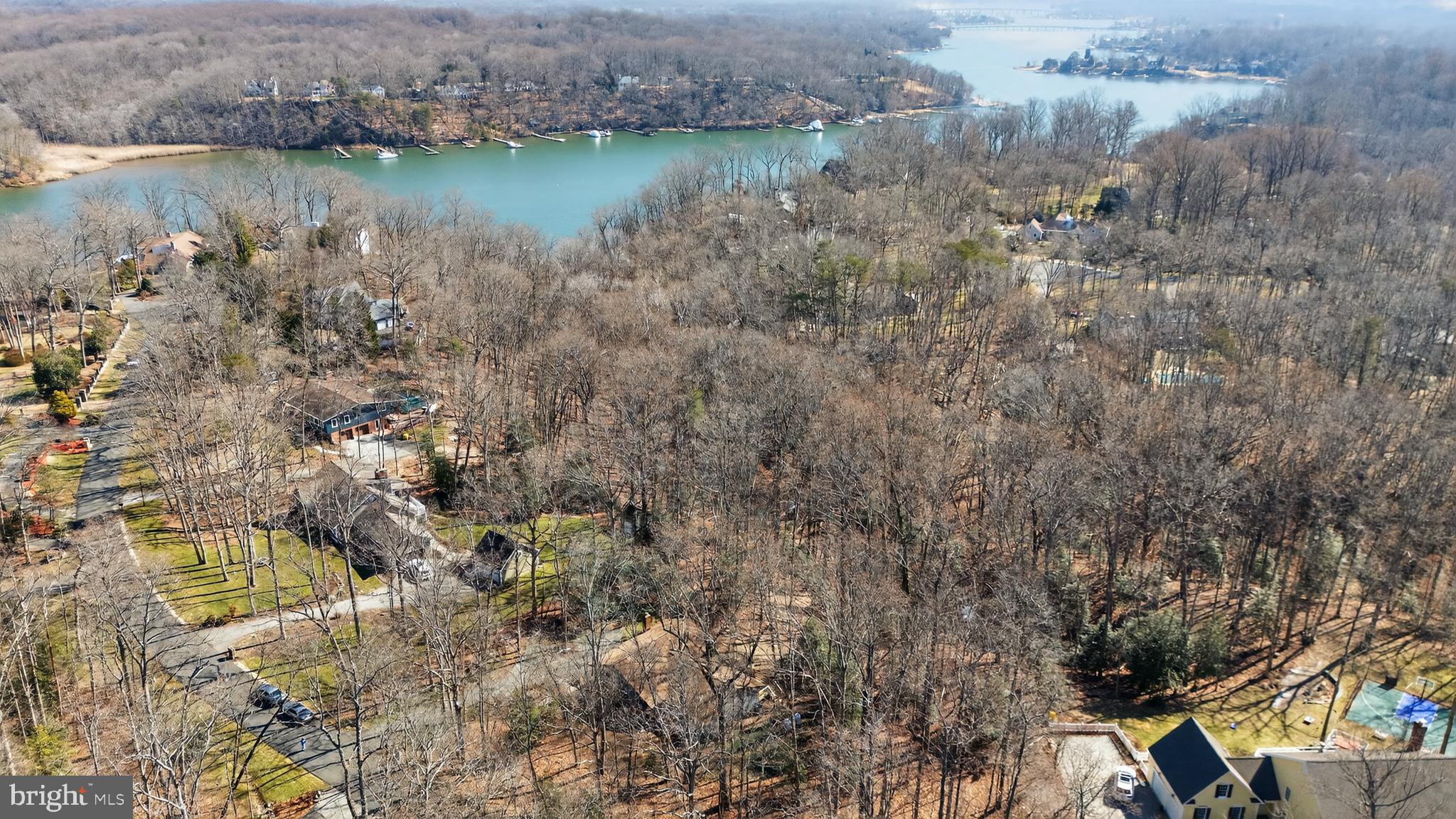 655 Santa Maria Lane Davidsonville, MD 21035 - Photo 35 of 54 a view of a lake with houses