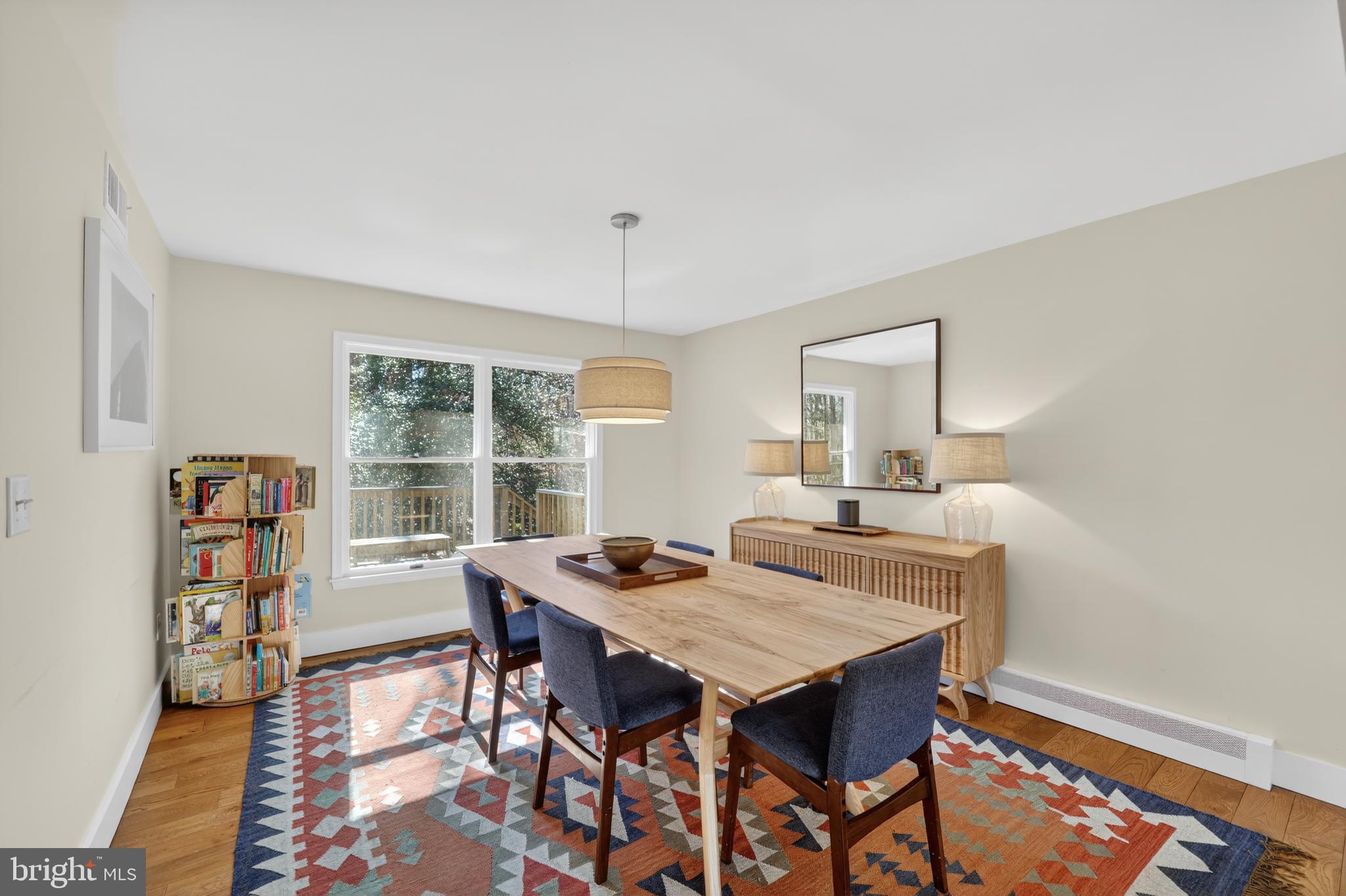 655 Santa Maria Lane Davidsonville, MD 21035 - Photo 8 of 54 a view of a dining room with furniture and a table