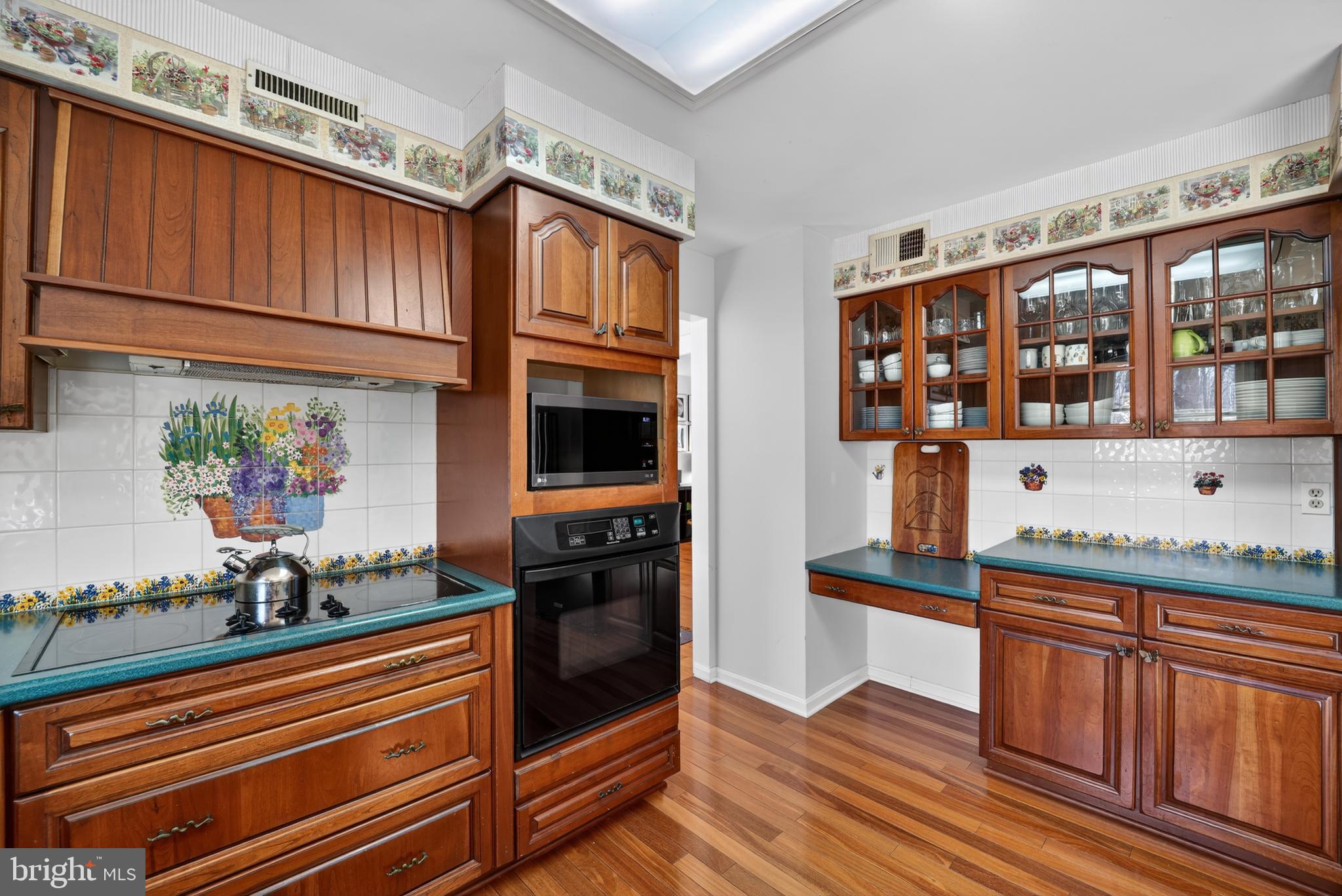 655 Santa Maria Lane Davidsonville, MD 21035 - Photo 10 of 54 a kitchen with stainless steel appliances granite countertop a stove and a sink