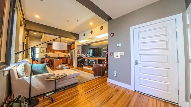 a outdoor space with lots of wooden furniture