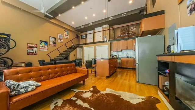 a lobby with furniture and rug