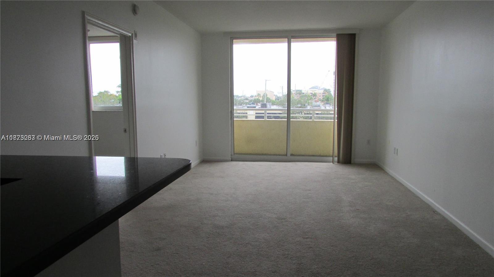 2775 Northeast 187th Street, Unit 205 Aventura, FL 33180 - Photo 15 of 53 an empty room with windows