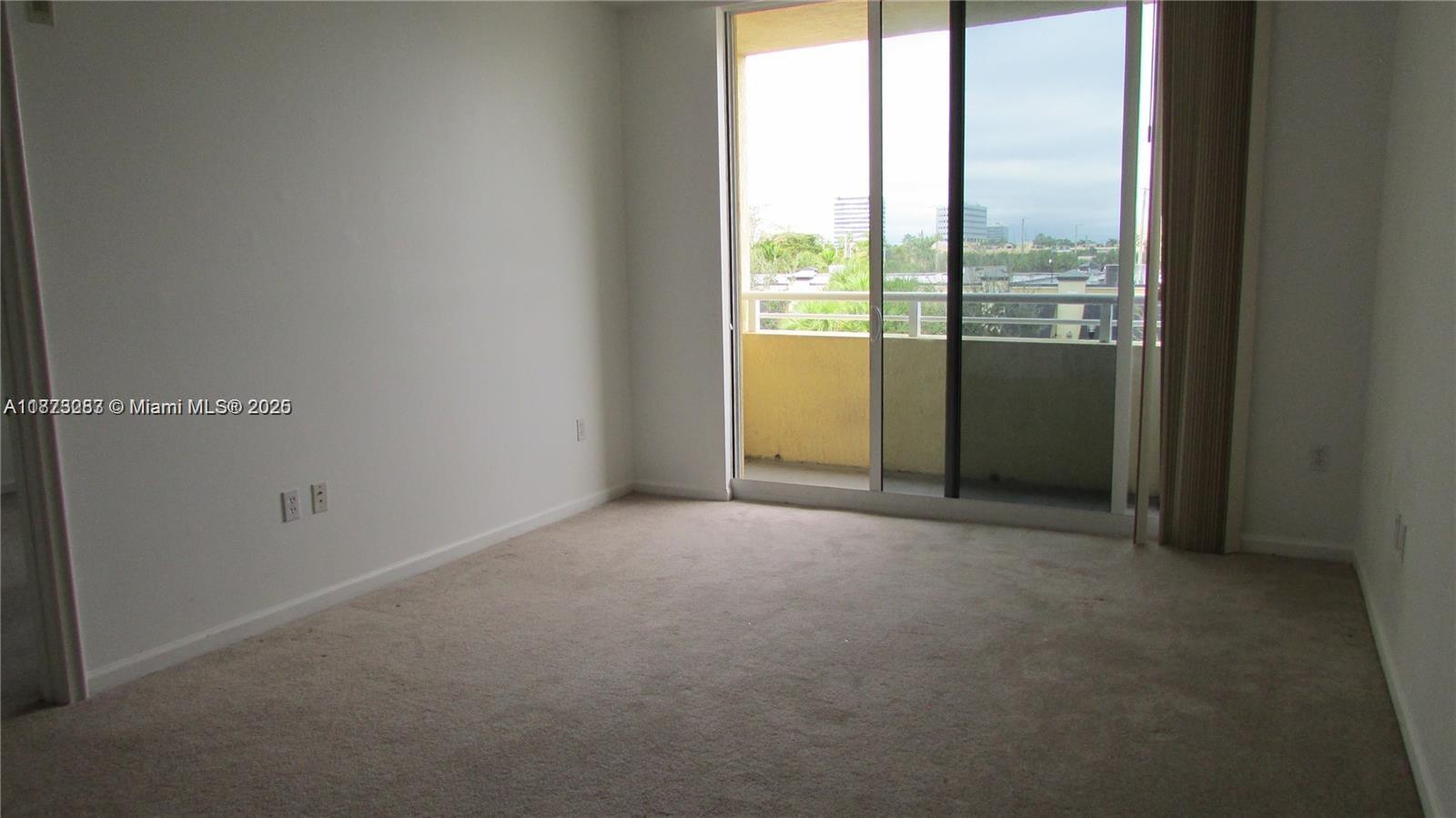 2775 Northeast 187th Street, Unit 205 Aventura, FL 33180 - Photo 19 of 53 a view of an empty room with a window