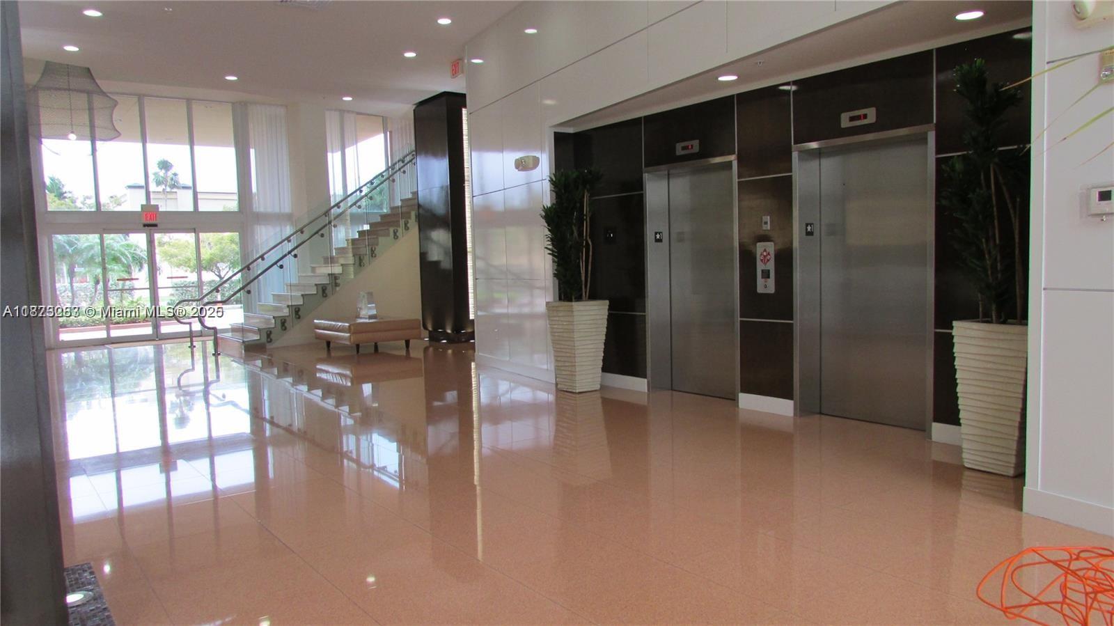 2775 Northeast 187th Street, Unit 205 Aventura, FL 33180 - Photo 49 of 53 a view of entryway with livingroom